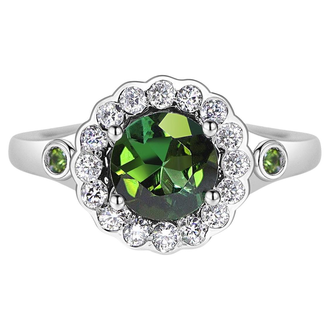 For Sale:  10k White Gold 1ct Natural Green Tourmaline & Diamond '.28t.c.w' Halo Ring