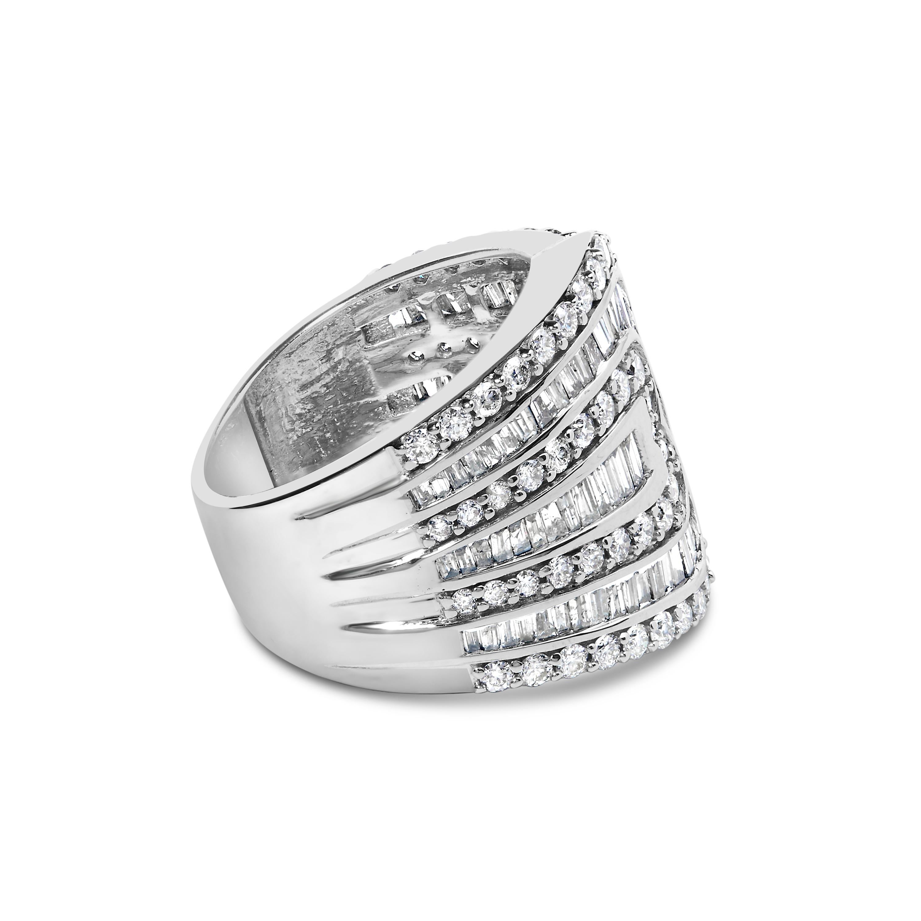 Bold and brilliant, this magnificent cluster diamond ring has an impressive total carat weight of 2 1/2 c.t. This piece is crafted in genuine 10k White Gold, a metal that will stay tarnish free for years to come. The ring shines with alternating