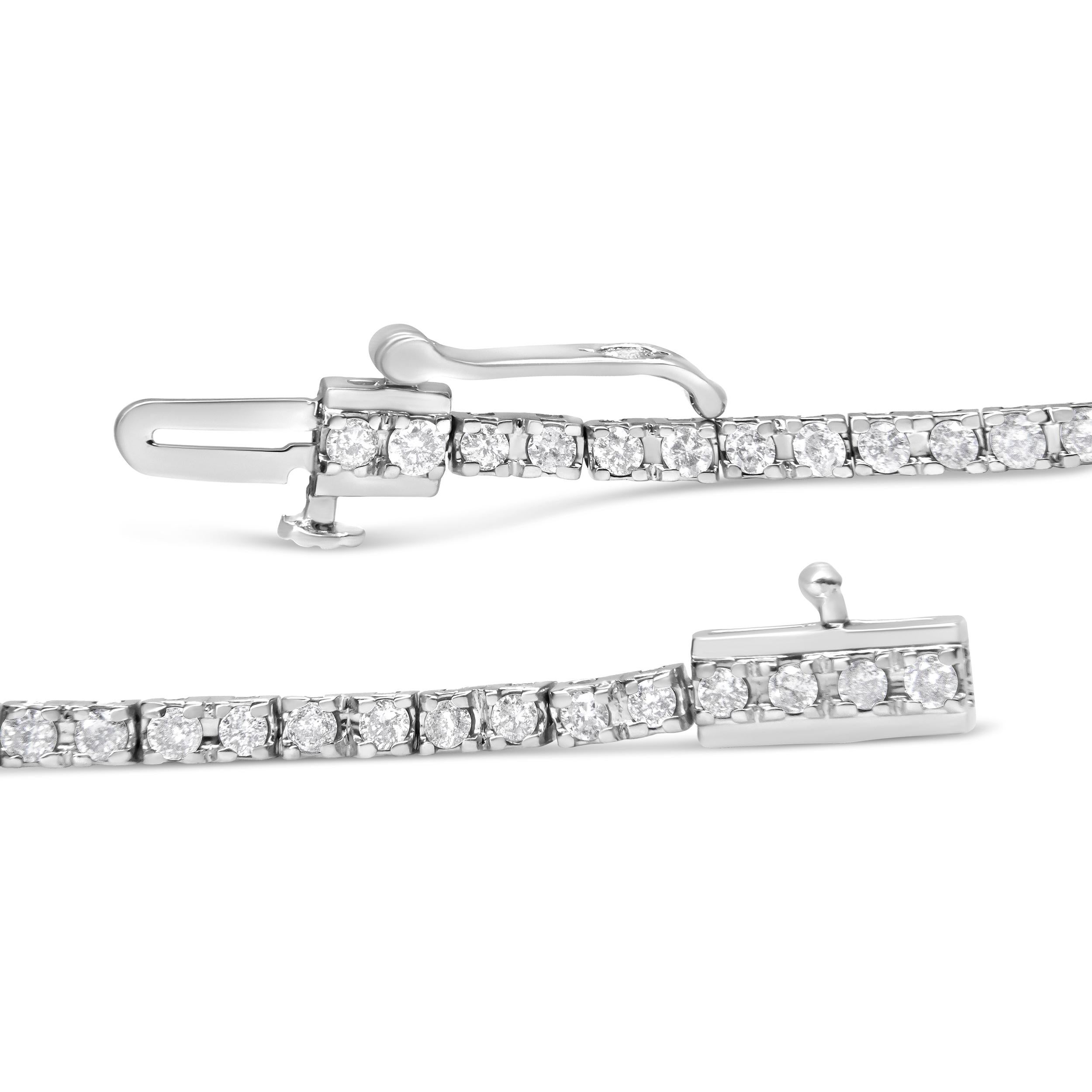 Elevate her attire with the luxe look of this magnificent diamond tennis bracelet. Crafted in cool 10K white gold, this spectacular design features 78 dazzling 0.026 cttw diamonds. Ravishing with 2 ct. t.w. of diamonds and a brilliant buffed luster,