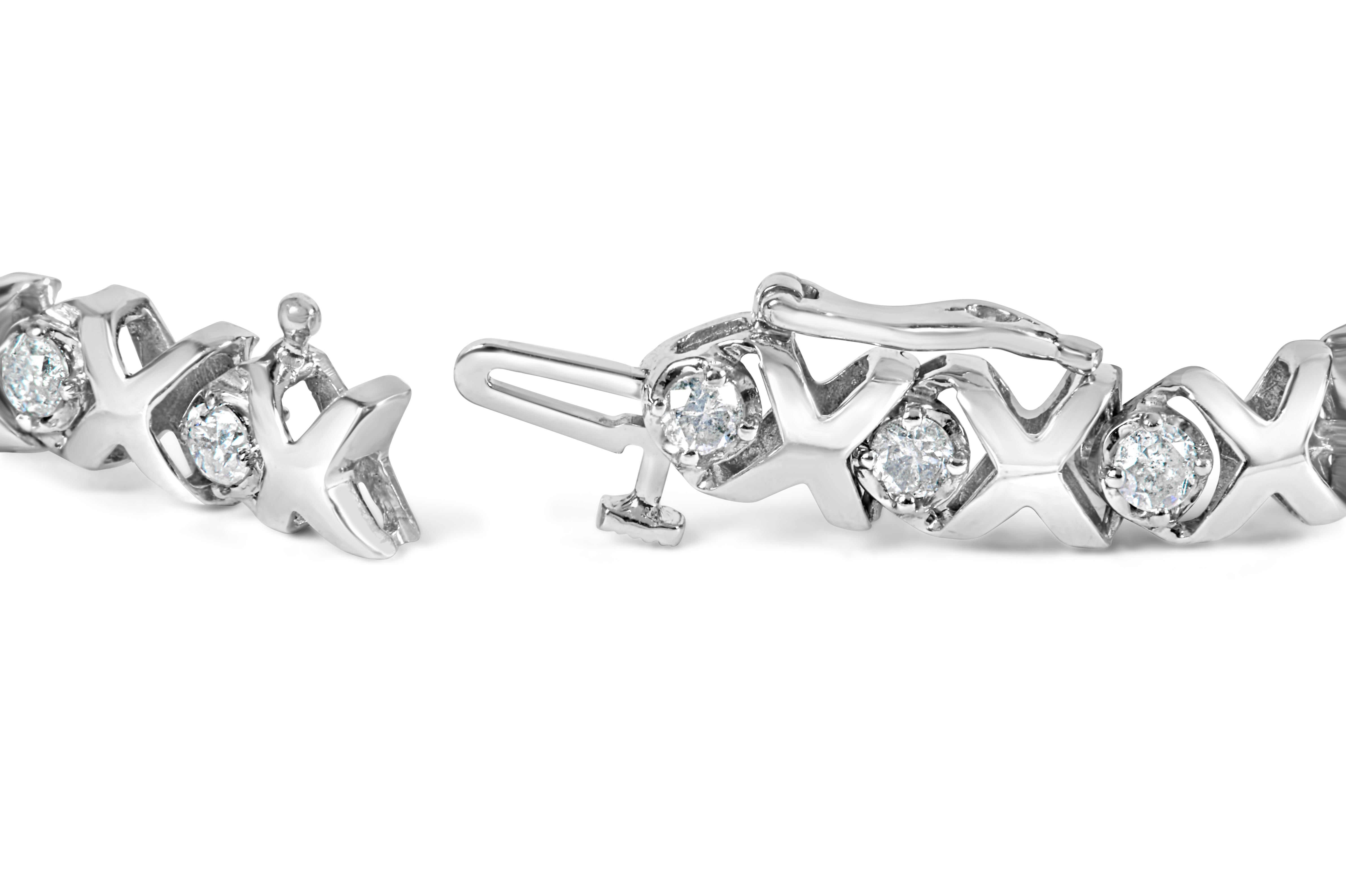 Indulge in the timeless elegance of our 10k White Gold Diamond 