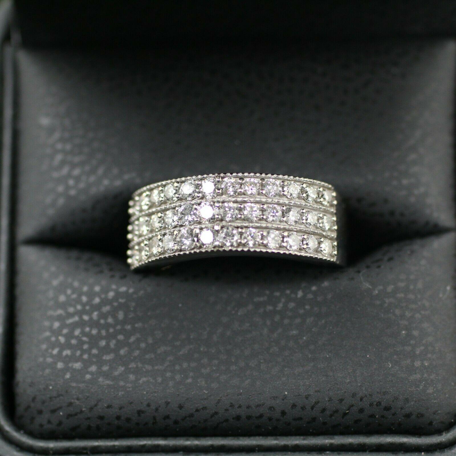 This is a 10k white gold ring with 36 round diamonds estimated 1.04tcw. Beautiful 3 row diamonds color I clarity SI2.Current ring size is 7US, but it can be resized to fit any finger. 
Specifications:
    main stone:DIAMOND
    diamonds:  36PCS RD