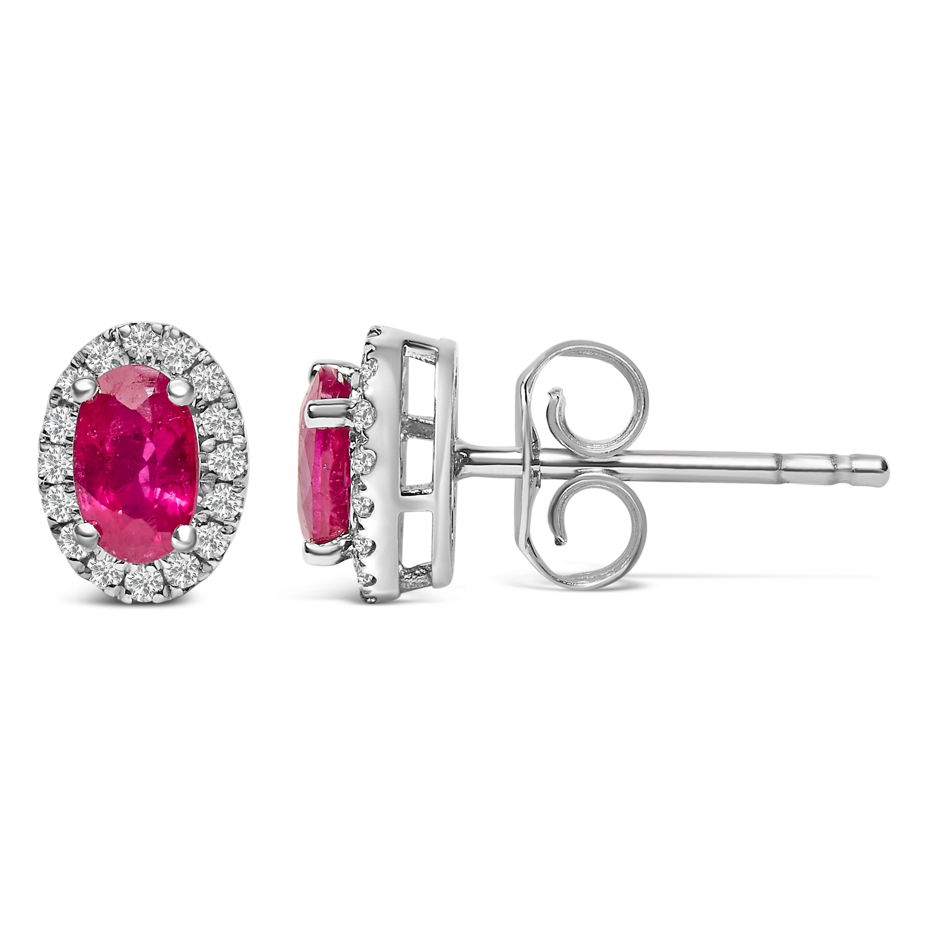 Modern 10K White Gold 5x3 MM Oval Red Ruby and Diamond Halo Stud Earrings For Sale