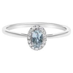 10K White Gold 5X3MM Oval Blue Aquamarine and Diamond Accent Halo Ring