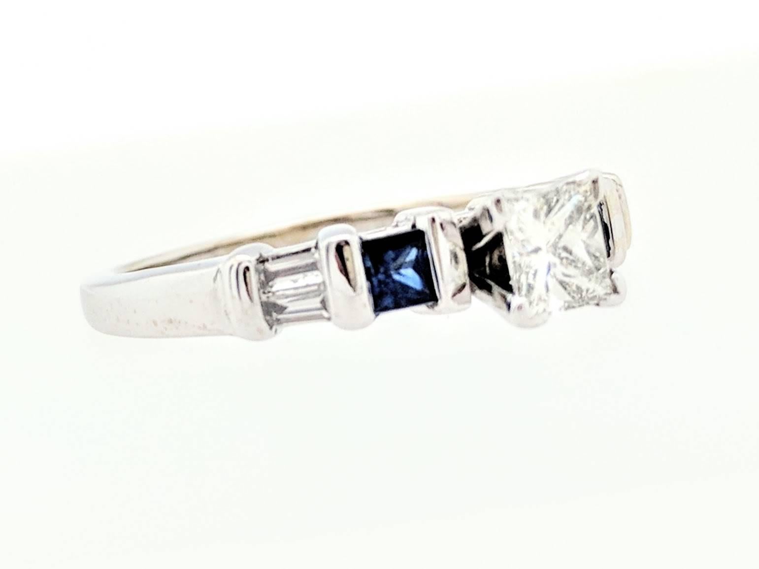Contemporary 10 Karat White Gold .63 Carat Diamond and Sapphire Engagement Ring