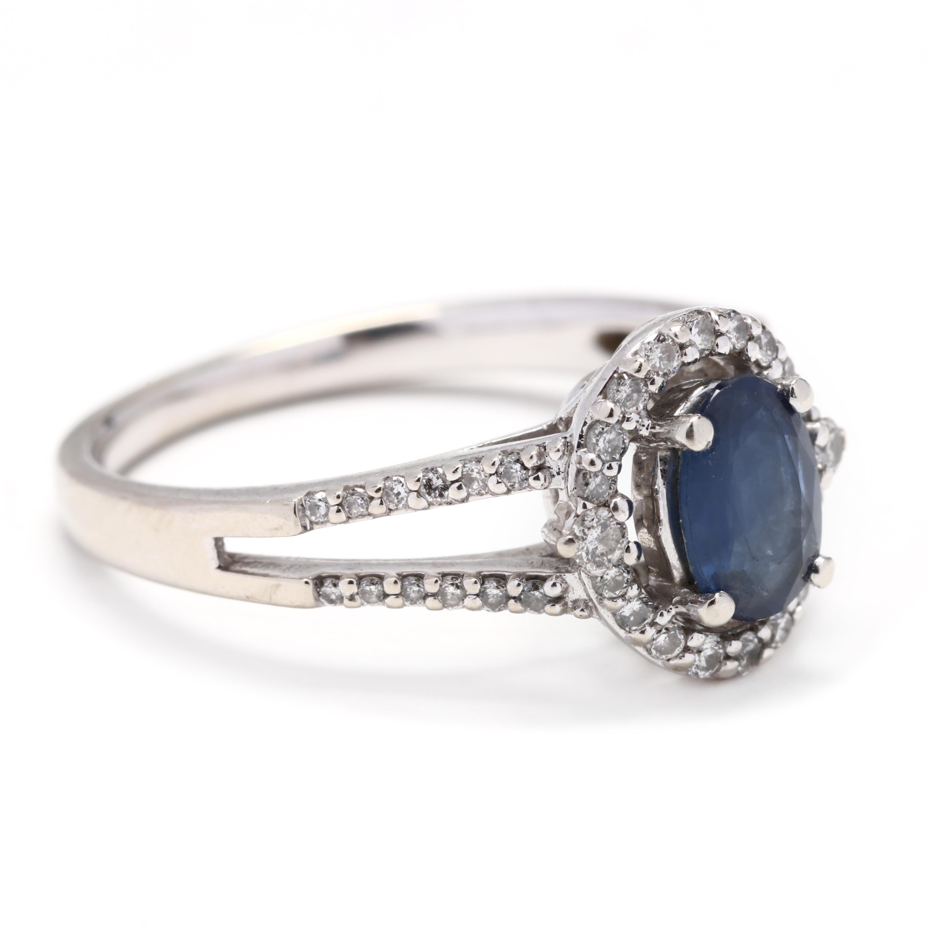 10k white gold, blue stone & diamond halo ring. An oval blue stone set in a diamond halo with a two row band or, split shank. The band is also set with diamonds for an elegant look. A great engagement ring or right-hand ring!

Stones:
- blue stone,