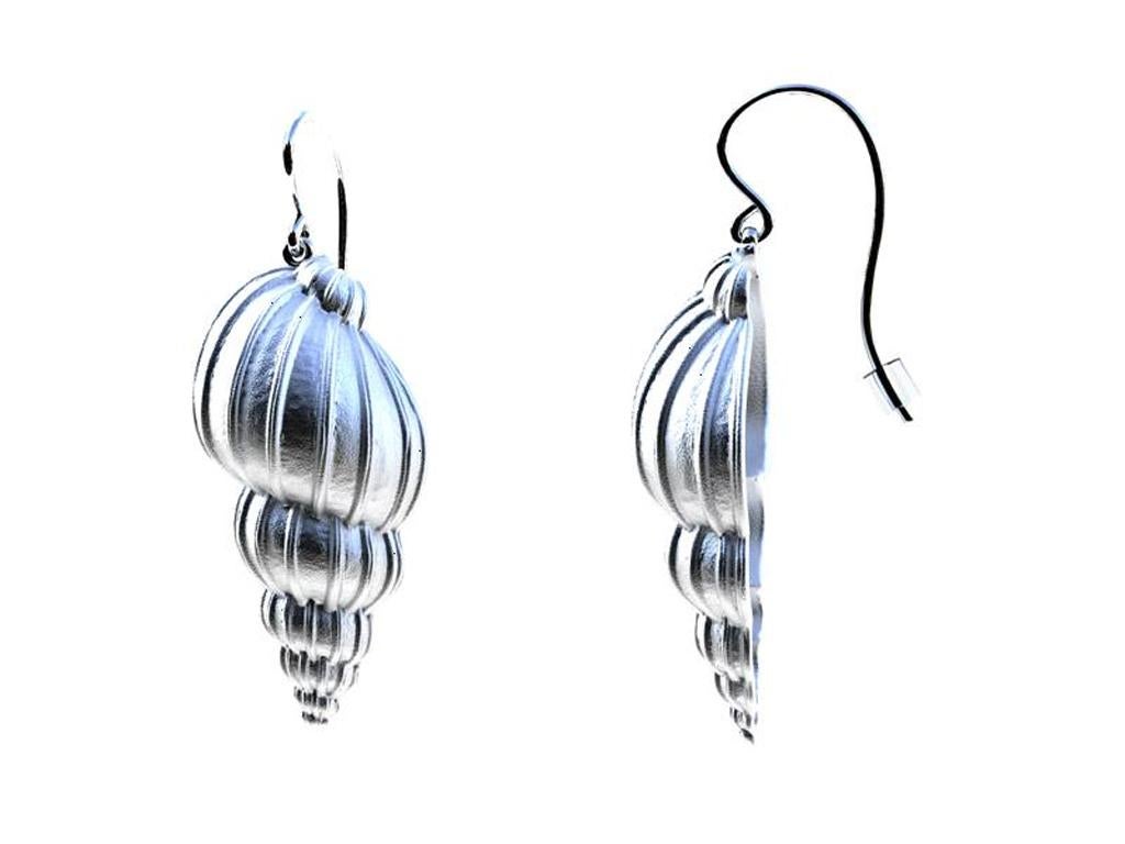 10K White Gold Bulbous Shell Earrings, The Ocean Series , This shell was fun to modify into a few styles. Simple clean vertical design lines accentuate this shell . Shell is just over 1 inch or 28 x 15 mm . With hook 40mm .
Matte finish. Made to