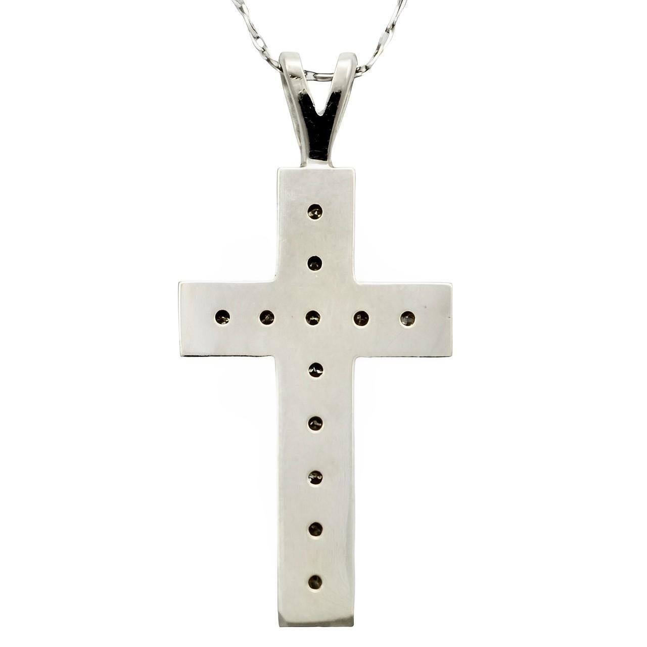 Beautiful 10K white gold fine rope chain with a white gold cross set with twelve diamonds. Measuring chain length 49 cm / 19.29 inches, and the diamond cross is length, including the hanging loop, 2.35 cm / .9 inch, by 1.1 cm / .4 inch.

This is a