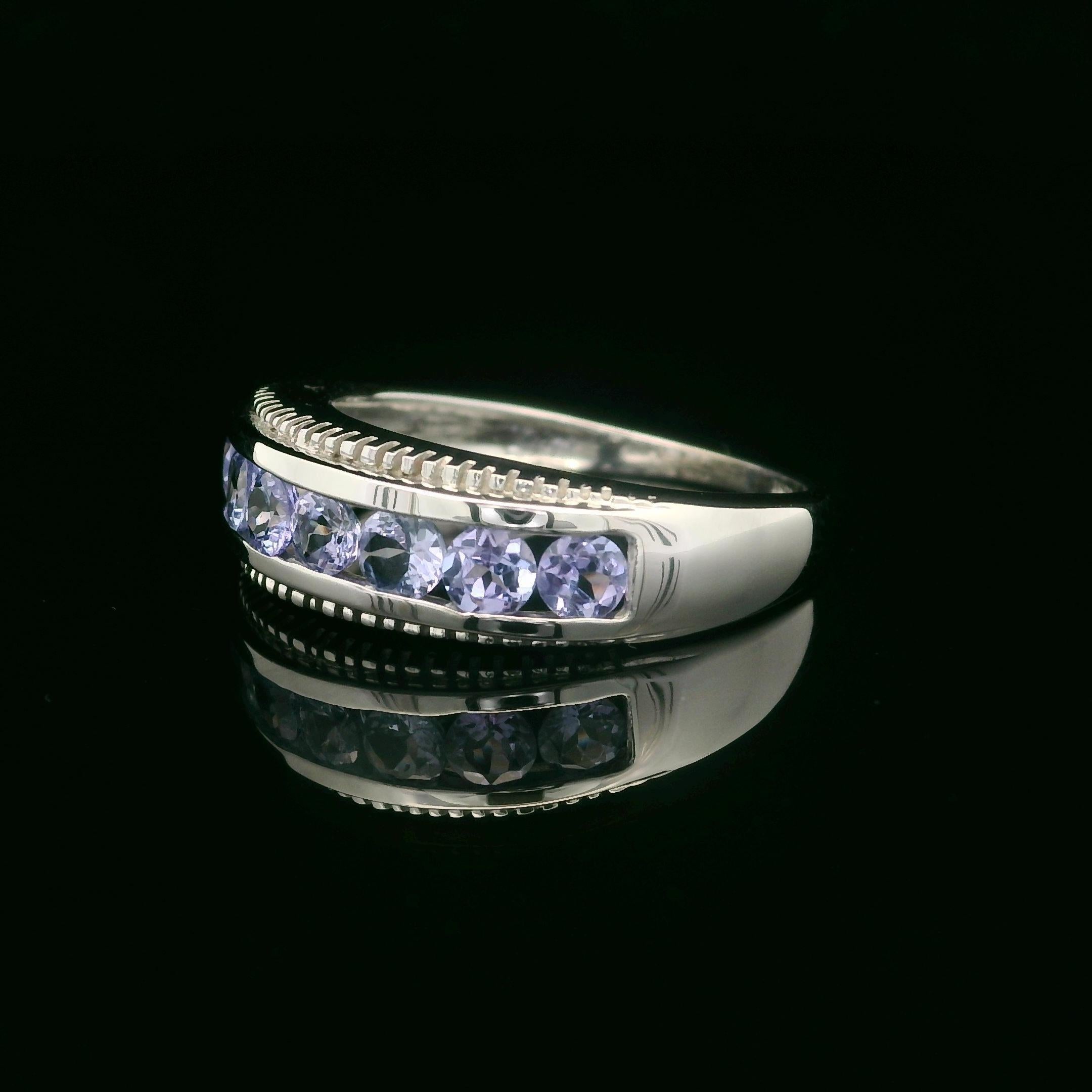 Women's 10k White Gold Channel Set Tanzanite 6.4mm Classic Milgrain Band Ring For Sale