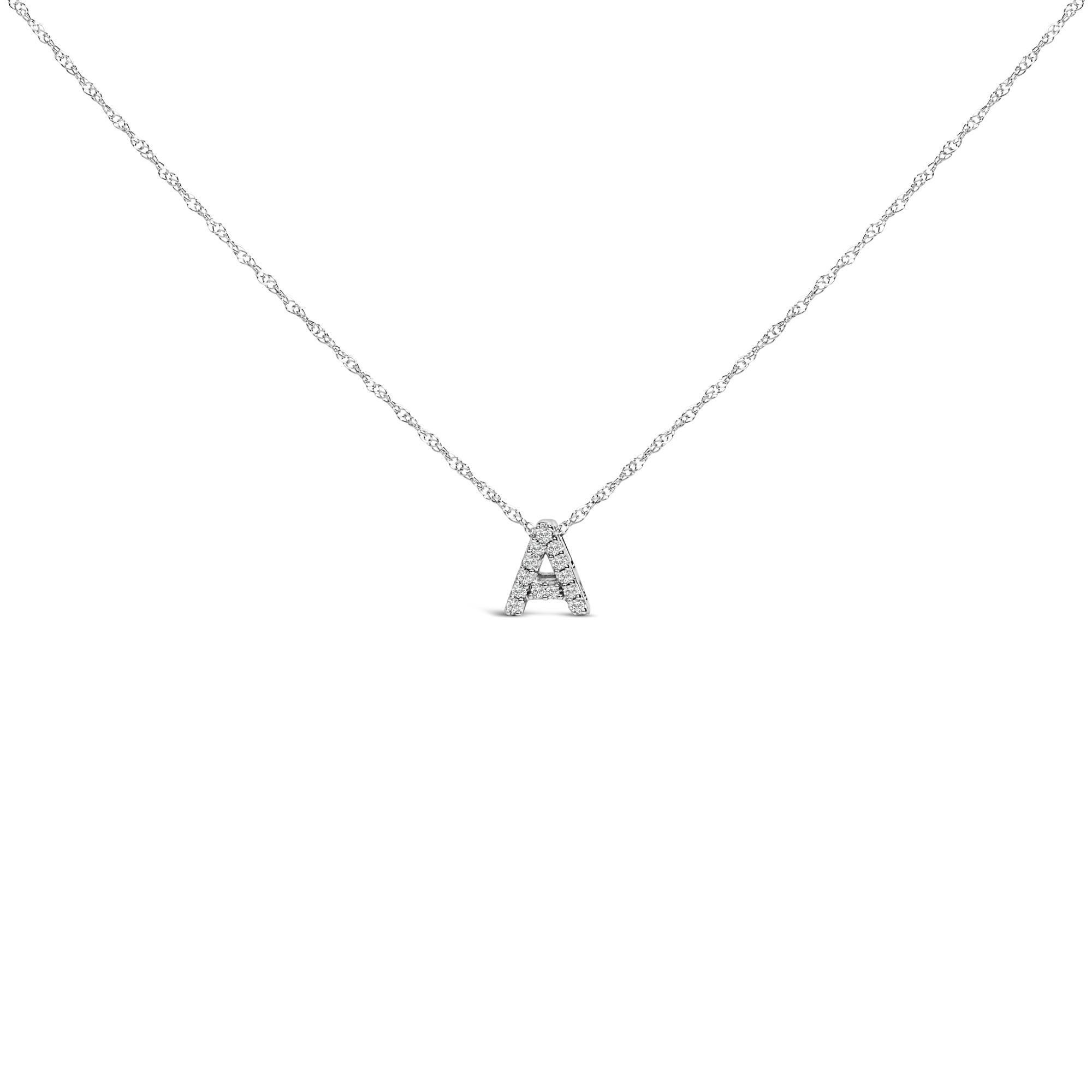 Mit persönlicher Symbolik und dezentem Glamour zelebriert diese exquisite Halskette mit Anhänger Identität und Individualität durch ihr funkelndes Design. Der charmante Anhänger mit dem Buchstaben 