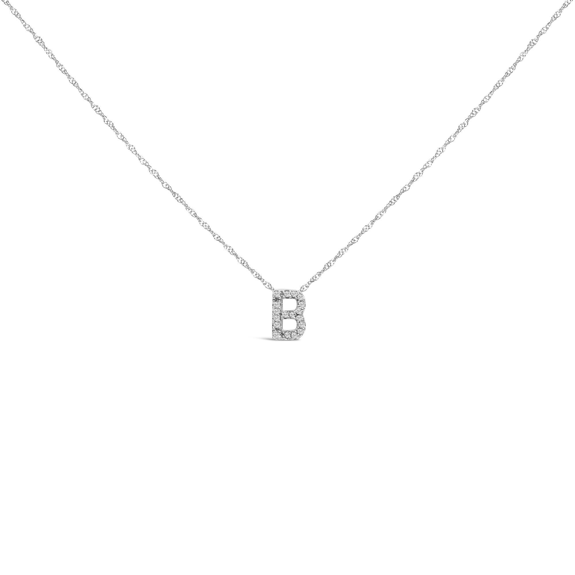 Mit persönlicher Symbolik und dezentem Glamour zelebriert diese exquisite Halskette mit Anhänger Identität und Individualität durch ihr funkelndes Design. Der charmante Anhänger mit dem Buchstaben 