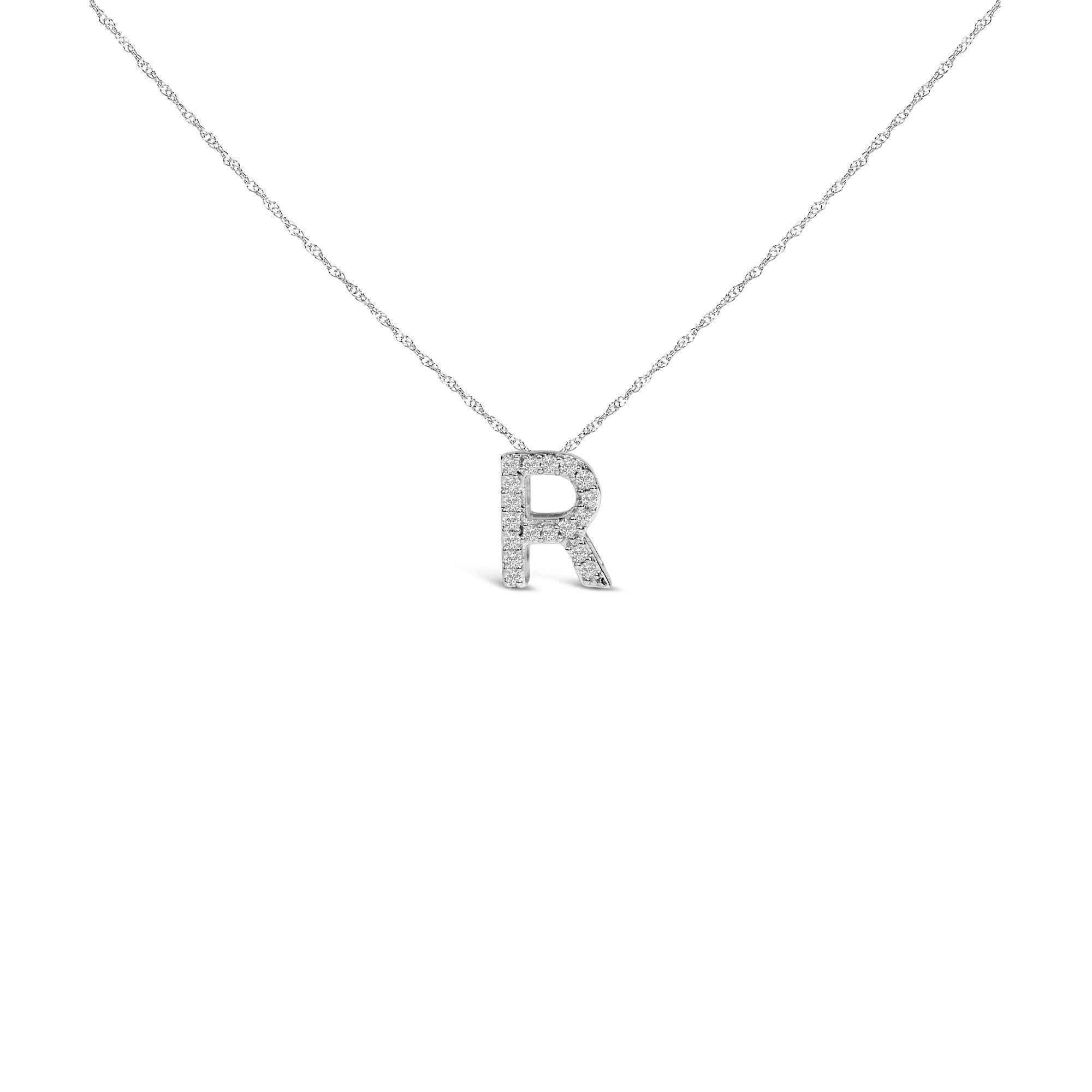 Mit persönlicher Symbolik und dezentem Glamour zelebriert diese exquisite Halskette mit Anhänger Identität und Individualität durch ihr funkelndes Design. Der charmante Anhänger mit dem Buchstaben 
