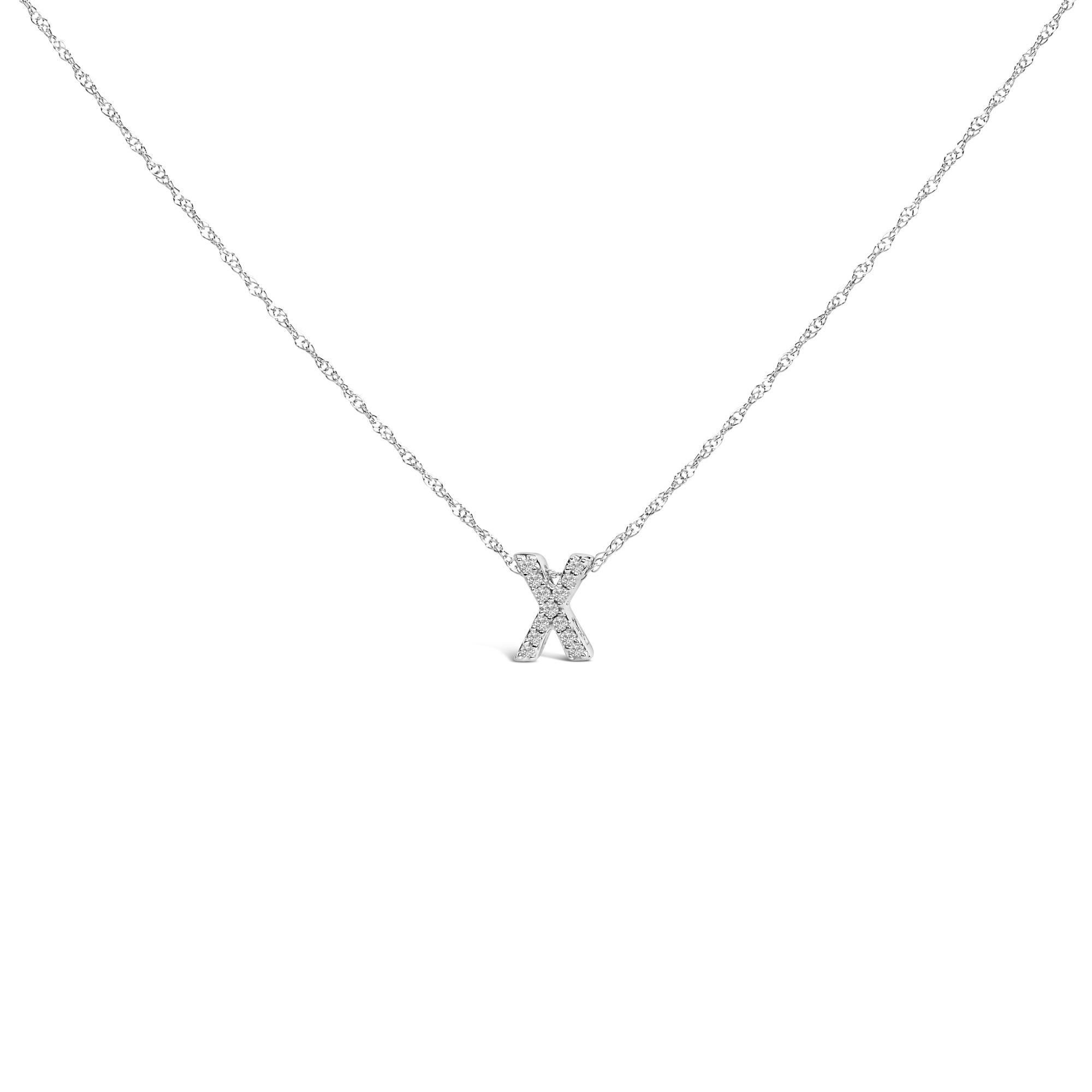 Mit persönlicher Symbolik und dezentem Glamour zelebriert diese exquisite Halskette mit Anhänger Identität und Individualität durch ihr funkelndes Design. Der charmante X