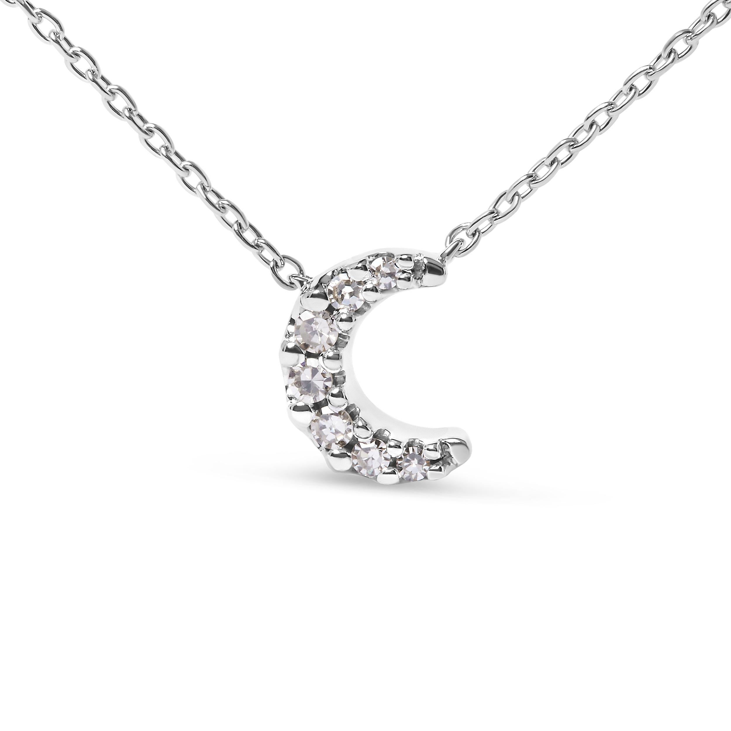 Introducing a celestial masterpiece that will captivate your heart and illuminate your style. This exquisite 10K White Gold Pendant Necklace features a stunning Crescent Moon design, adorned with accented 7 dazzling diamonds. The diamonds, carefully