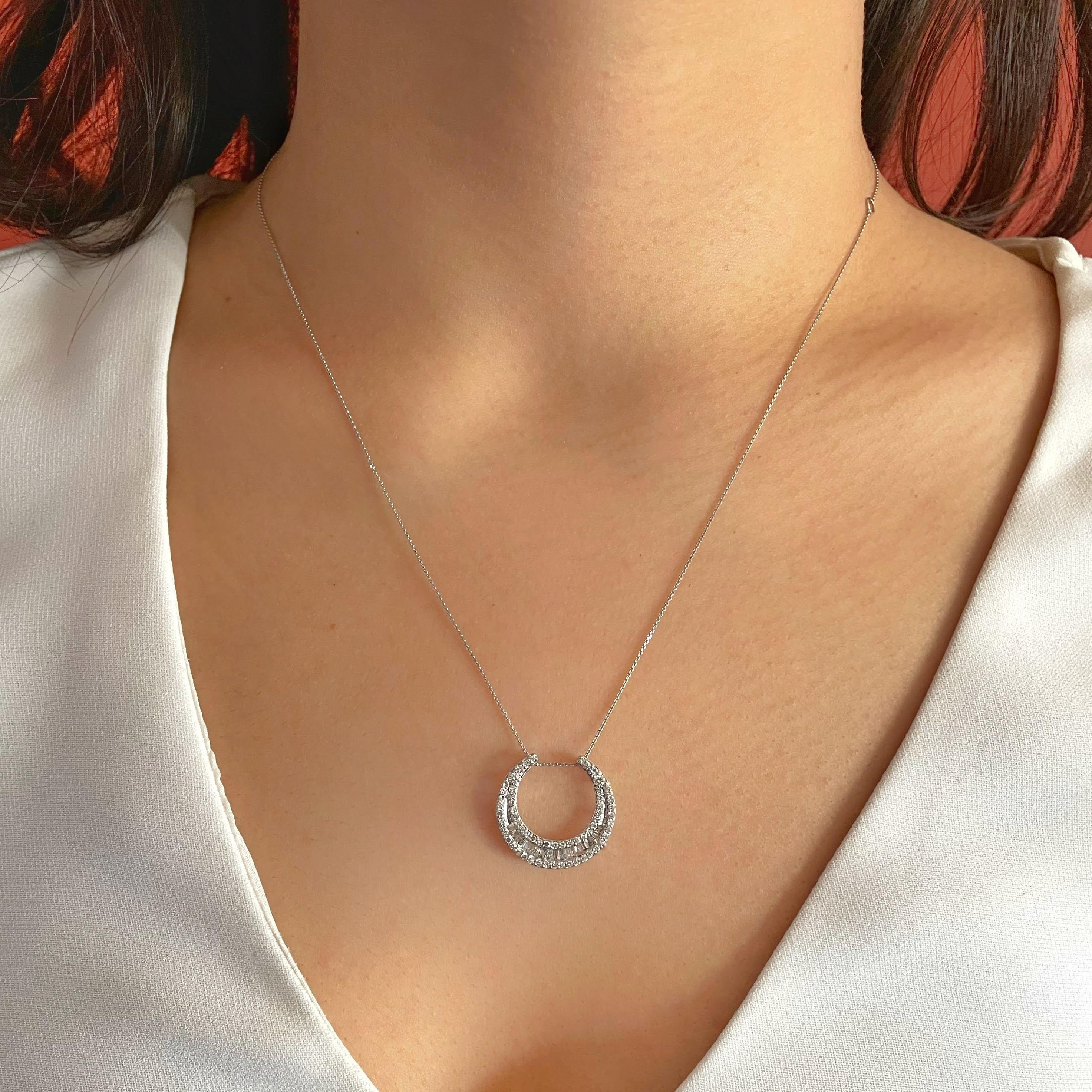 Discover the stylish design of our diamond fashion jewelry featuring this beautiful design of our Diamond Crescent Moon Necklace. This pendant comes with an adjustable chain so perfect as layering necklaces. Also available in 10K Yellow Gold.

10K