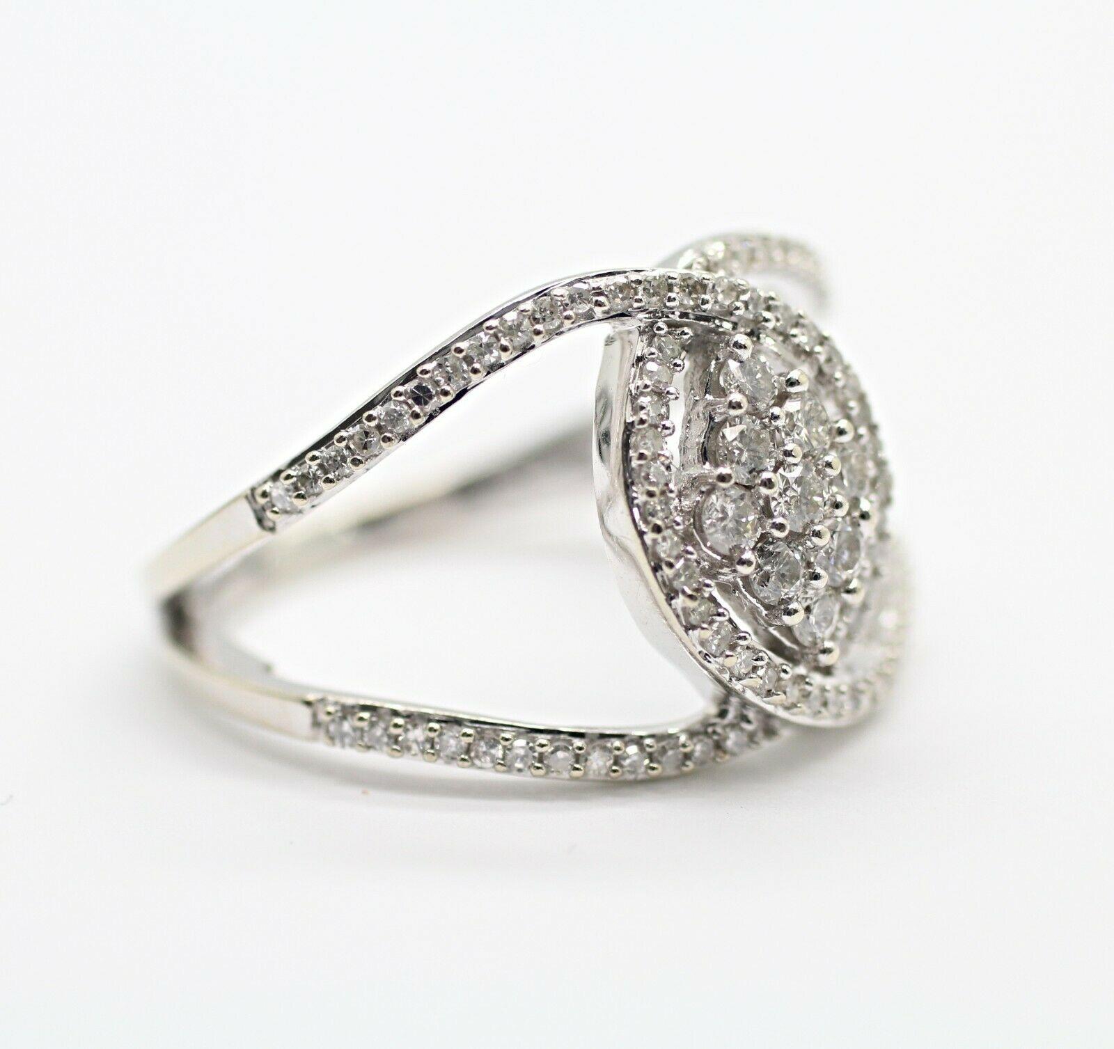 Contemporary 10 Karat White Gold Diamond Twist Ring