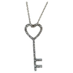 10K White Gold Heart-Key Pendant with Sparkling Diamonds