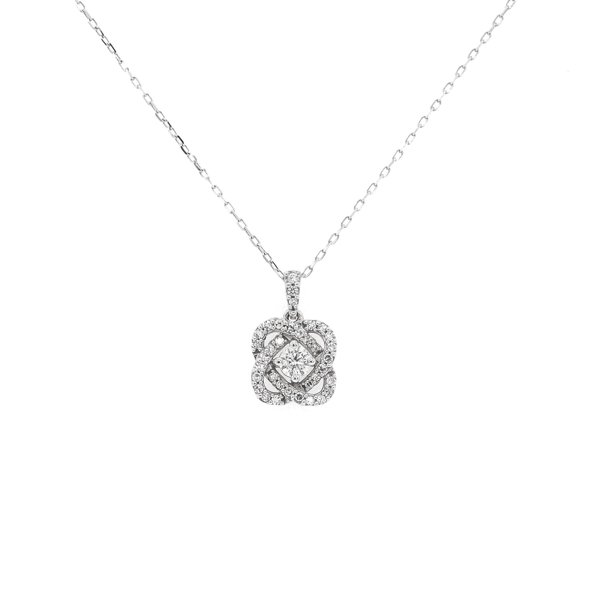 One lady's custom made polished 10K white gold princess, diamond uniform link necklace. The necklace measures approximately 18.00 inches in length and weighs a total of 2.70 grams. Engraved with 