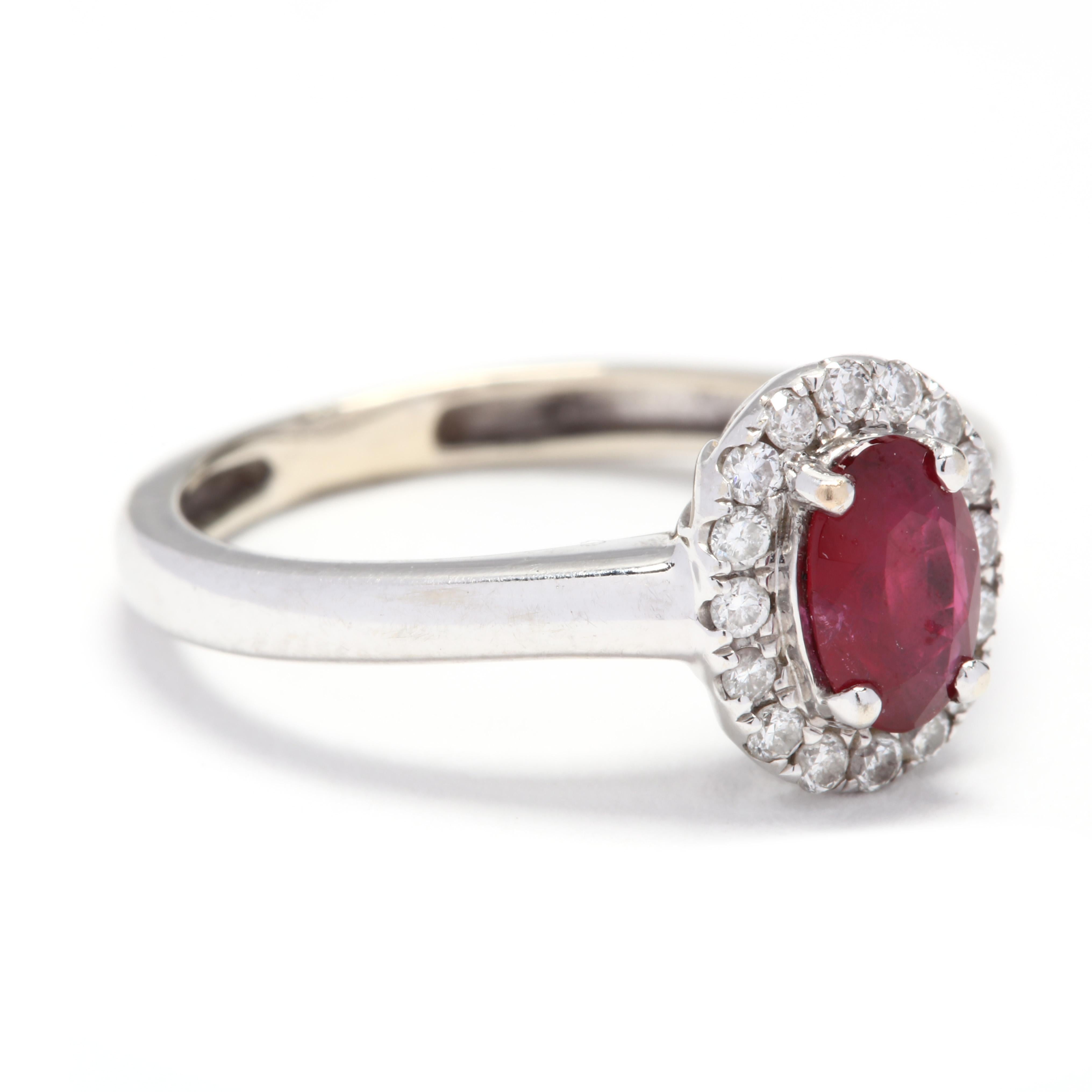 10k white gold oval ruby and diamond halo ring. A timeless diamond halo ring with a 0.60 carat oval ruby in the center. A delicate band makes this dainty and classic! The diamonds weigh approximately 0.12 carats total, are H-I in color and SI in