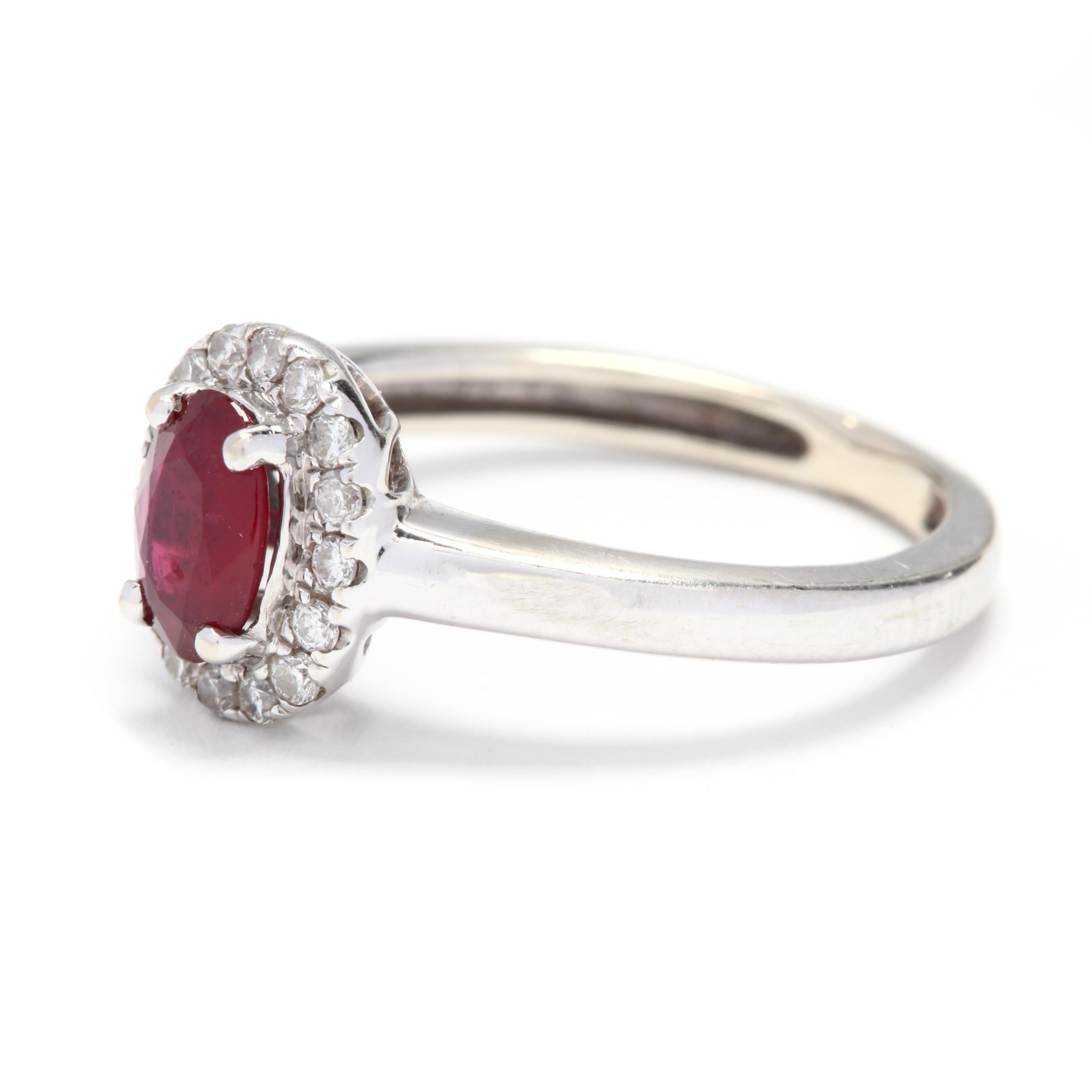 Oval Cut 10 Karat White Gold Oval Ruby and Diamond Halo Ring