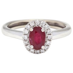 oval ruby rings 10 Karat White Gold Oval Ruby and Diamond Halo Ring
