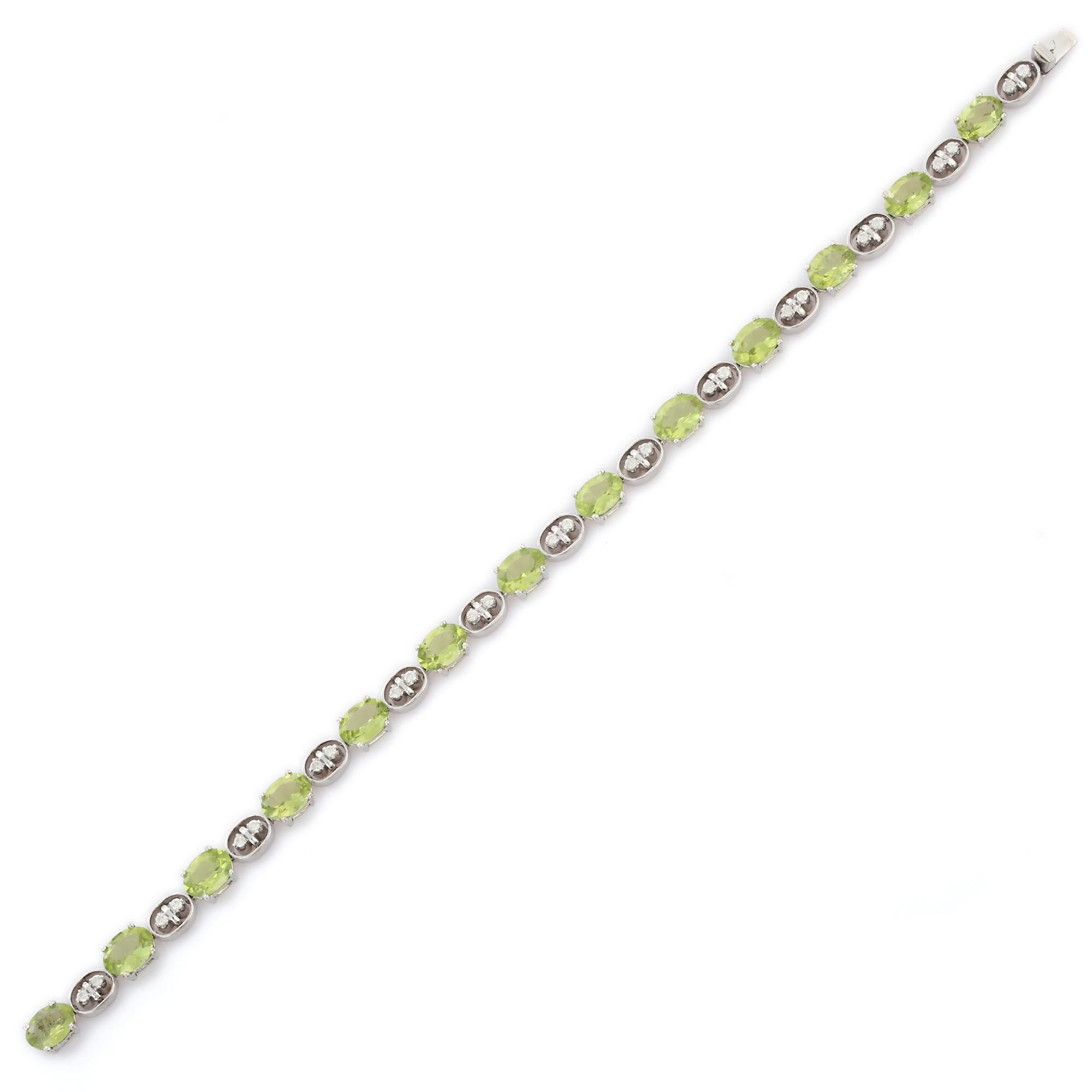This Peridot Diamond Tennis Bracelet in 10K gold showcases 13 endlessly sparkling natural peridot, weighing 9.15 carats and 26 diamonds weighing 0.38 carats. It measures 7.25 inches long in length. 
Peridot attracts love and calms anger by giving