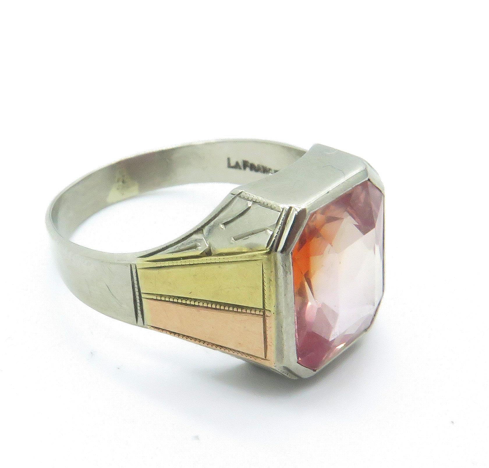 A beautiful, white gold us ring size 10 mens ring this ring has engraved inside the ring 