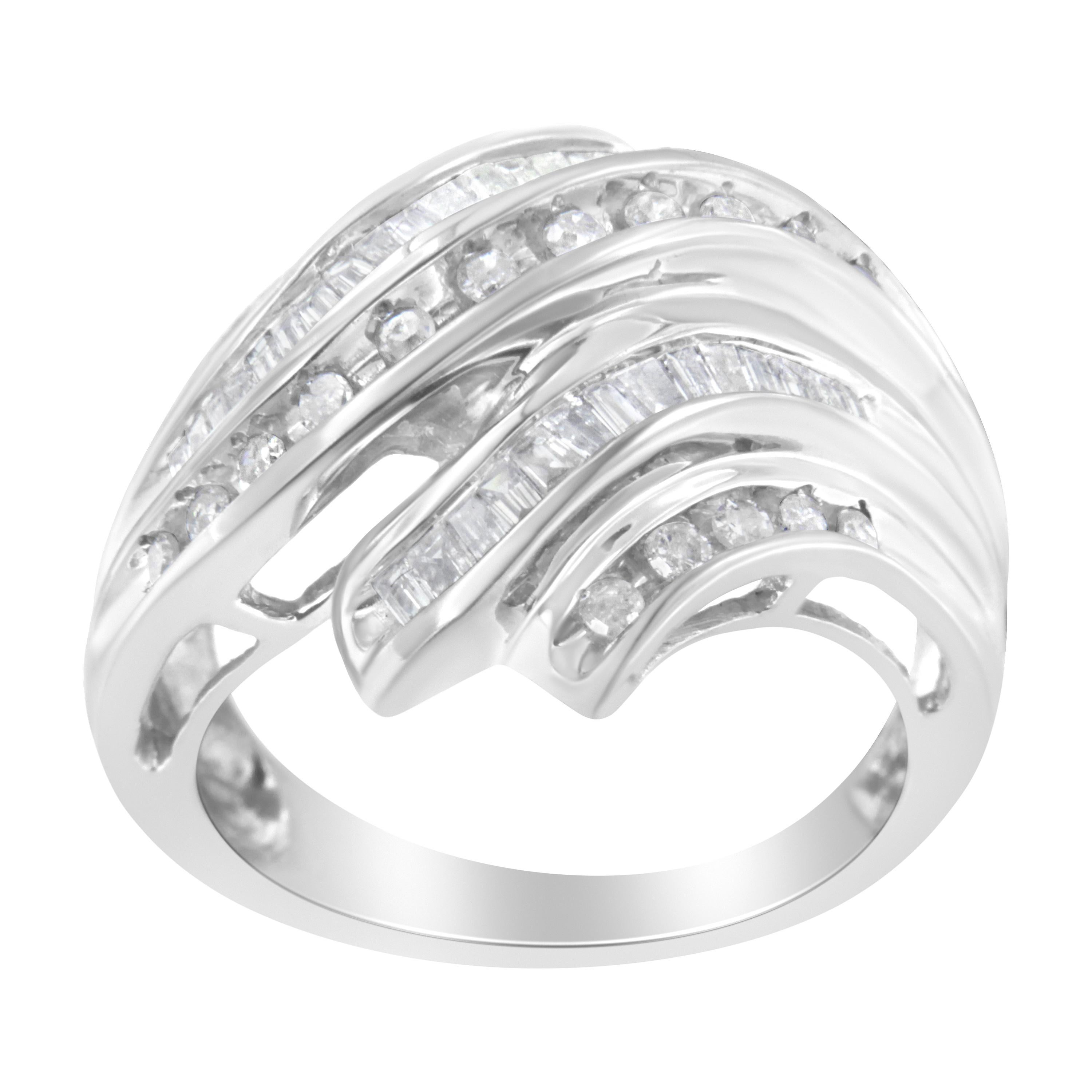 A diamond band that glistens with five rows of alternating channel set round and baguette diamonds in a serpentine shape. The band is crafted in cool 10 karat white gold and has a total diamond weight of 3/4 carats.

Product Features:

Diamond Type: