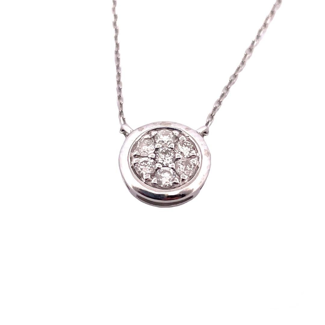 10K White Gold Round Diamond Pendant Necklace

Elevate your look with our exquisite 10K white gold round diamond pendant necklace. This enchanting piece boasts seven dazzling round diamonds, totaling 0.15 carats. With a weight of just 1 gram and a