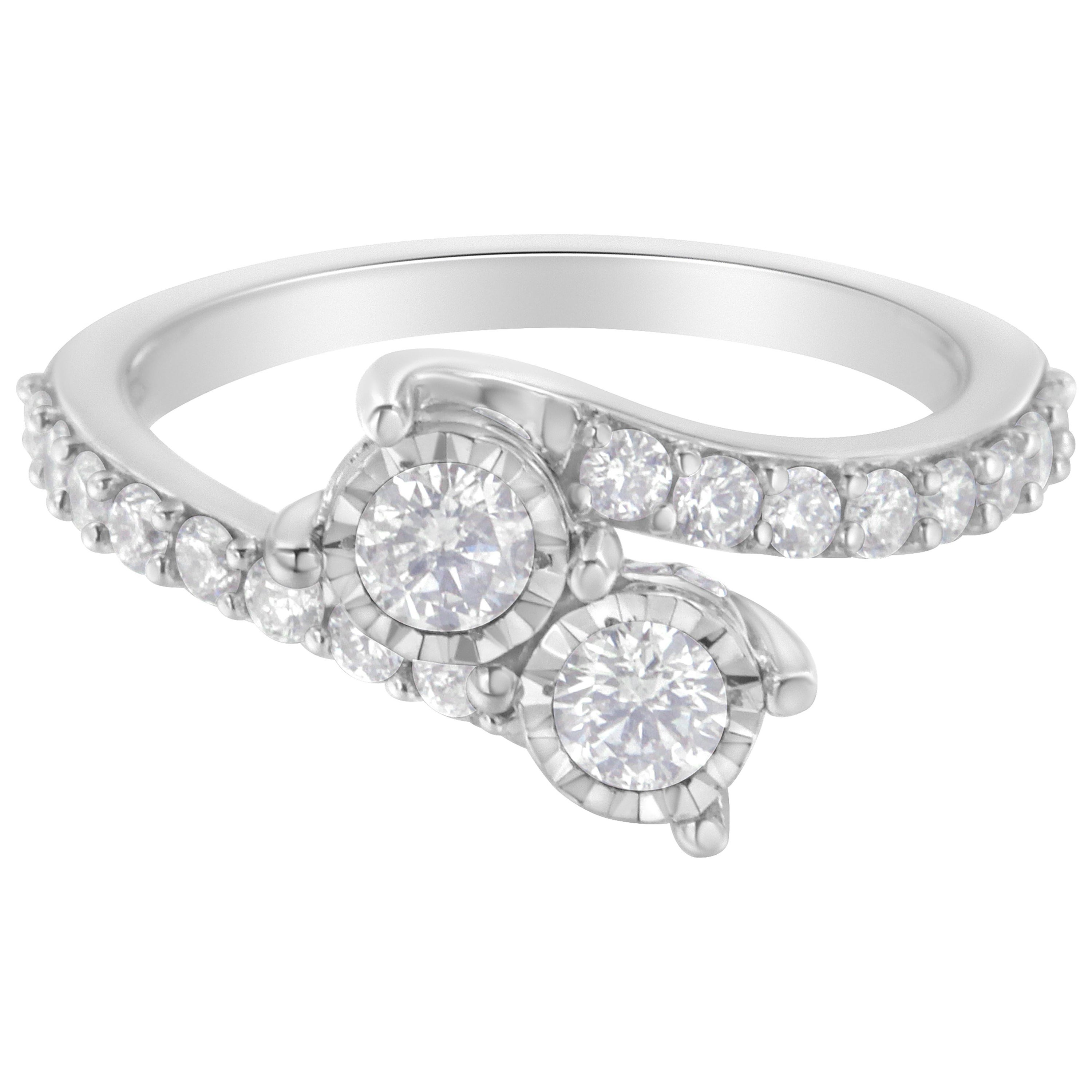 Anillo de oro blanco de 10 quilates con dos piedras engastadas milagrosamente con un diamante de 1 qt