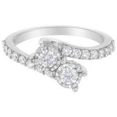 Anillo de oro blanco de 10 quilates con dos piedras engastadas milagrosamente con un diamante de 1 qt