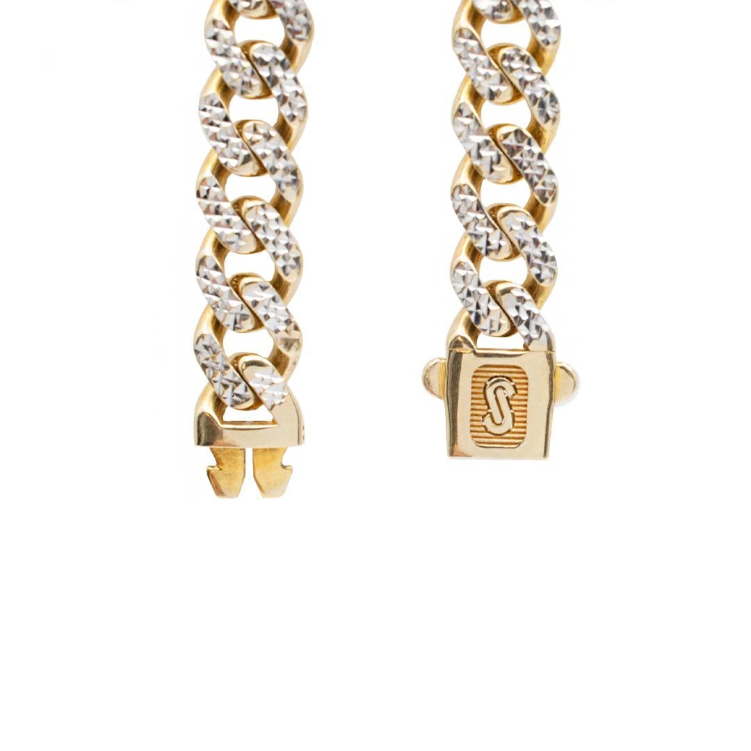 One custom made textured & polished 10K white & yellow gold hollow curb link chain. The chain measures approximately 22.00 inches in length and weighs a total of 20.50 grams. Engraved with 