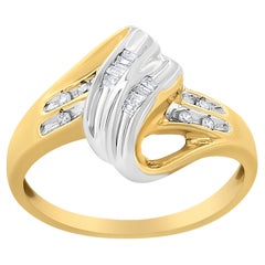 10K Yellow and White Gold 1/10 Carat Baguette and Round-Cut Diamond Bypass Ring