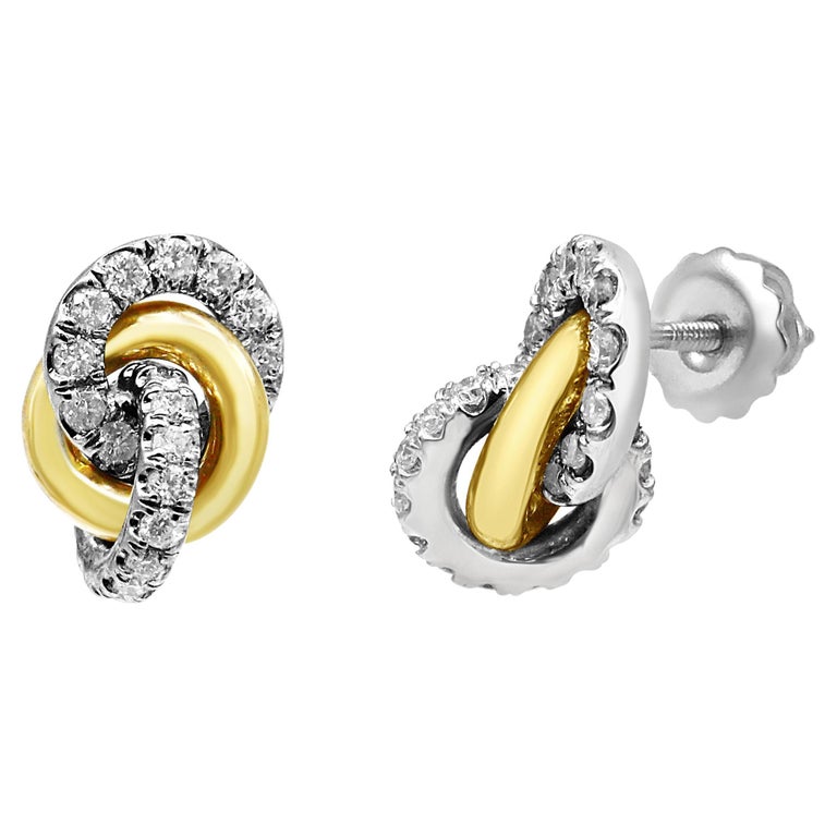 Sold at Auction: CHANEL Style INTERLOCKING C FASHION EARRINGS, 2 PR