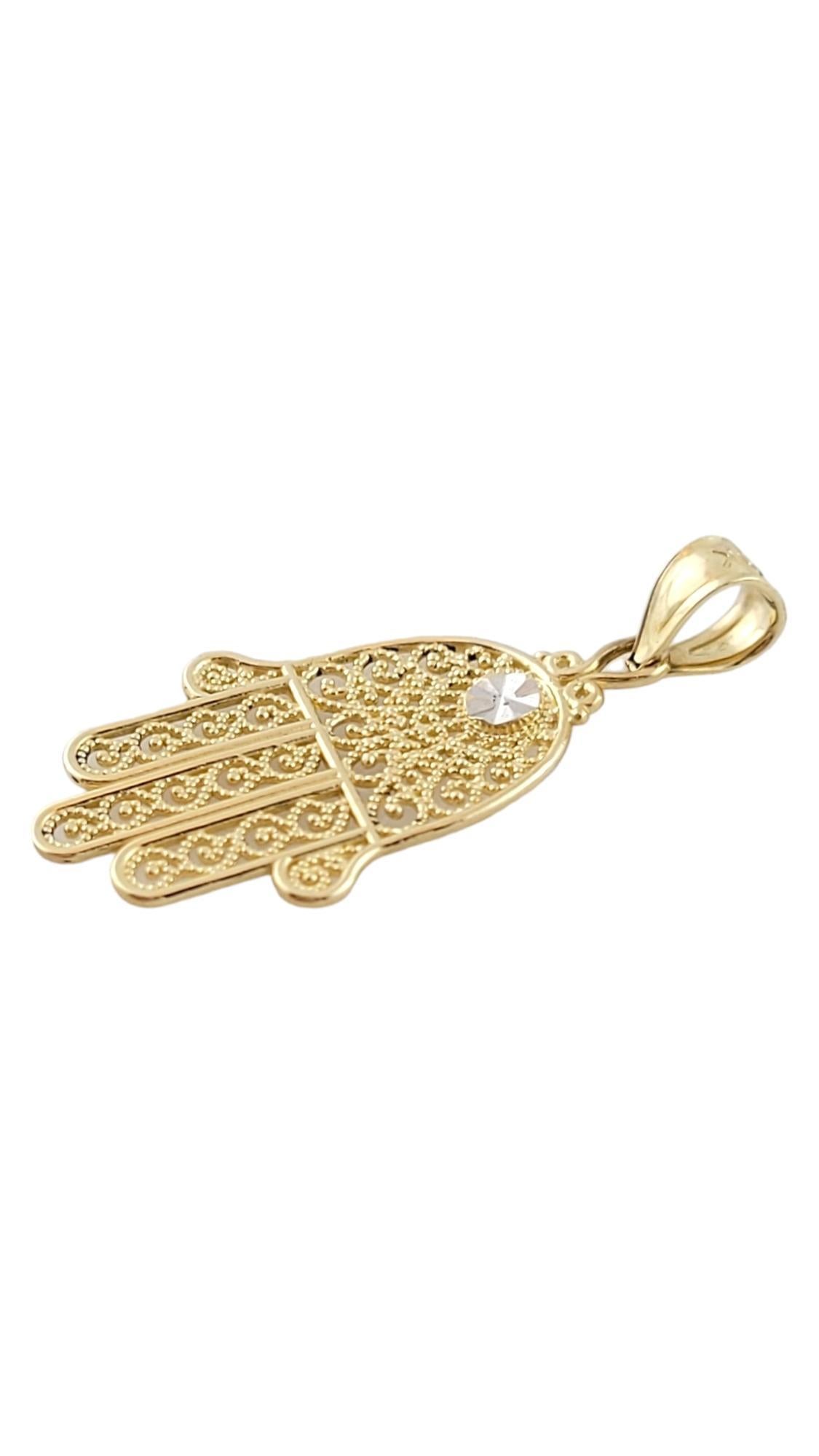 Vintage 10K Yellow and White Gold Hamsa Hand Pendant

This gorgeous Hamsa hand pendant is crafted with amazing detailing from 10K yellow gold with white gold details!

Size: 23.3mm X 12.9mm x 0.72mm
Length with bail: 27.56mm

Weight: 0.5 dwt/ 0.7