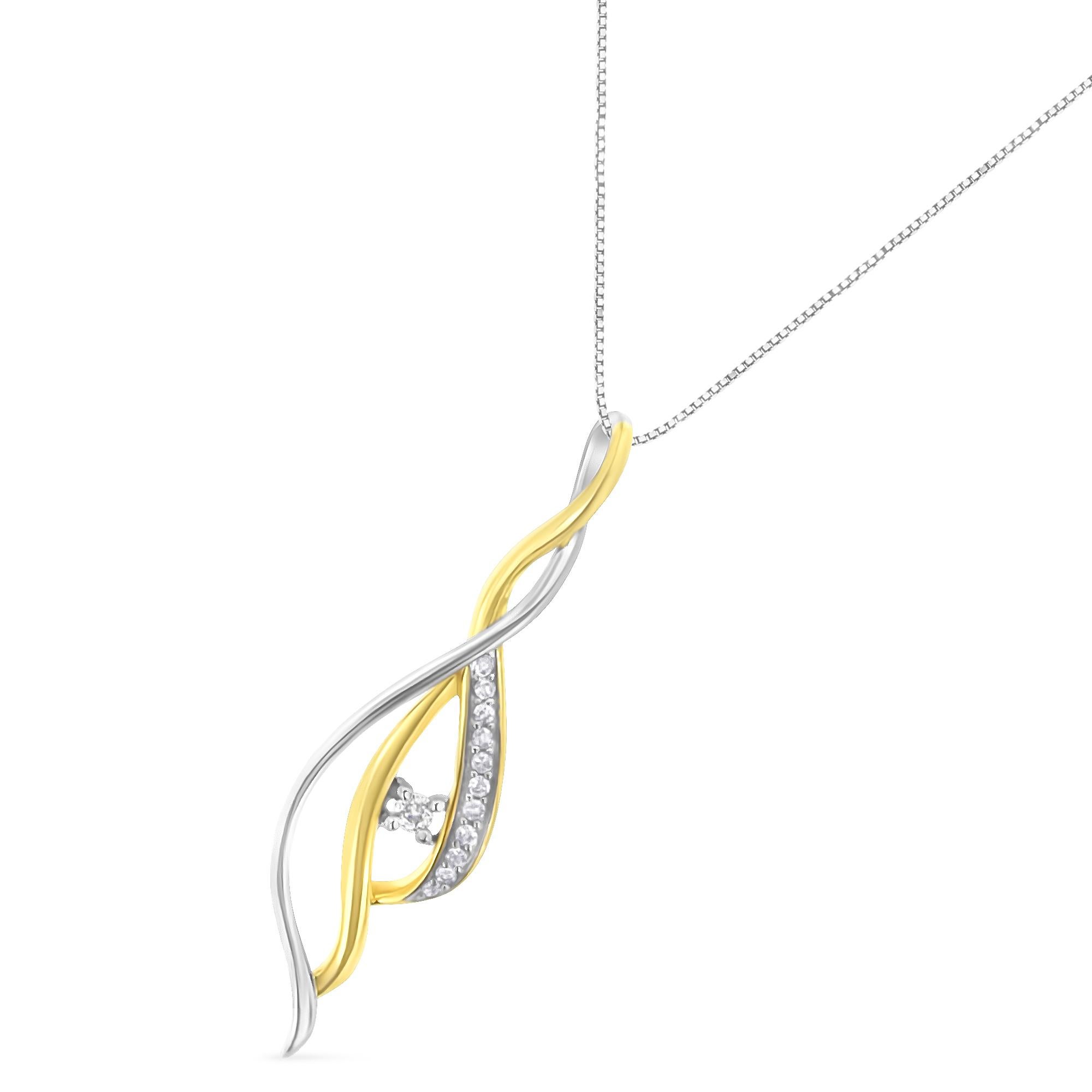 Spirali d'oro bianco 10kt e oro giallo 10kt si uniscono a cascata per creare uno splendido effetto a spirale intorno a un diamante solitario centrale. Il pezzo è ulteriormente arricchito da un accento di 11 diamanti più piccoli lungo il bordo.