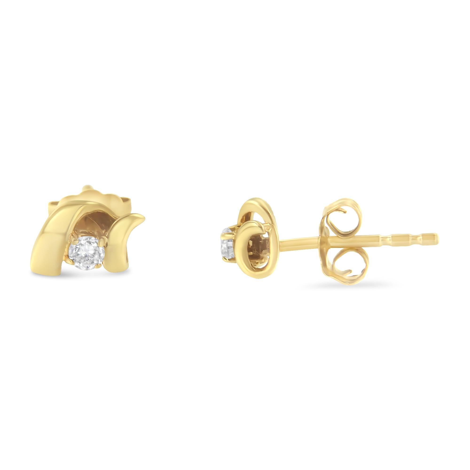 Add sparkle to your look with these solitaire earrings. Crafted in 10k yellow gold, these earrings display 1/10 carat TDW of round cut diamonds. A glittering prong set diamond sits in the middle of a white gold ribbons that twists and creates a