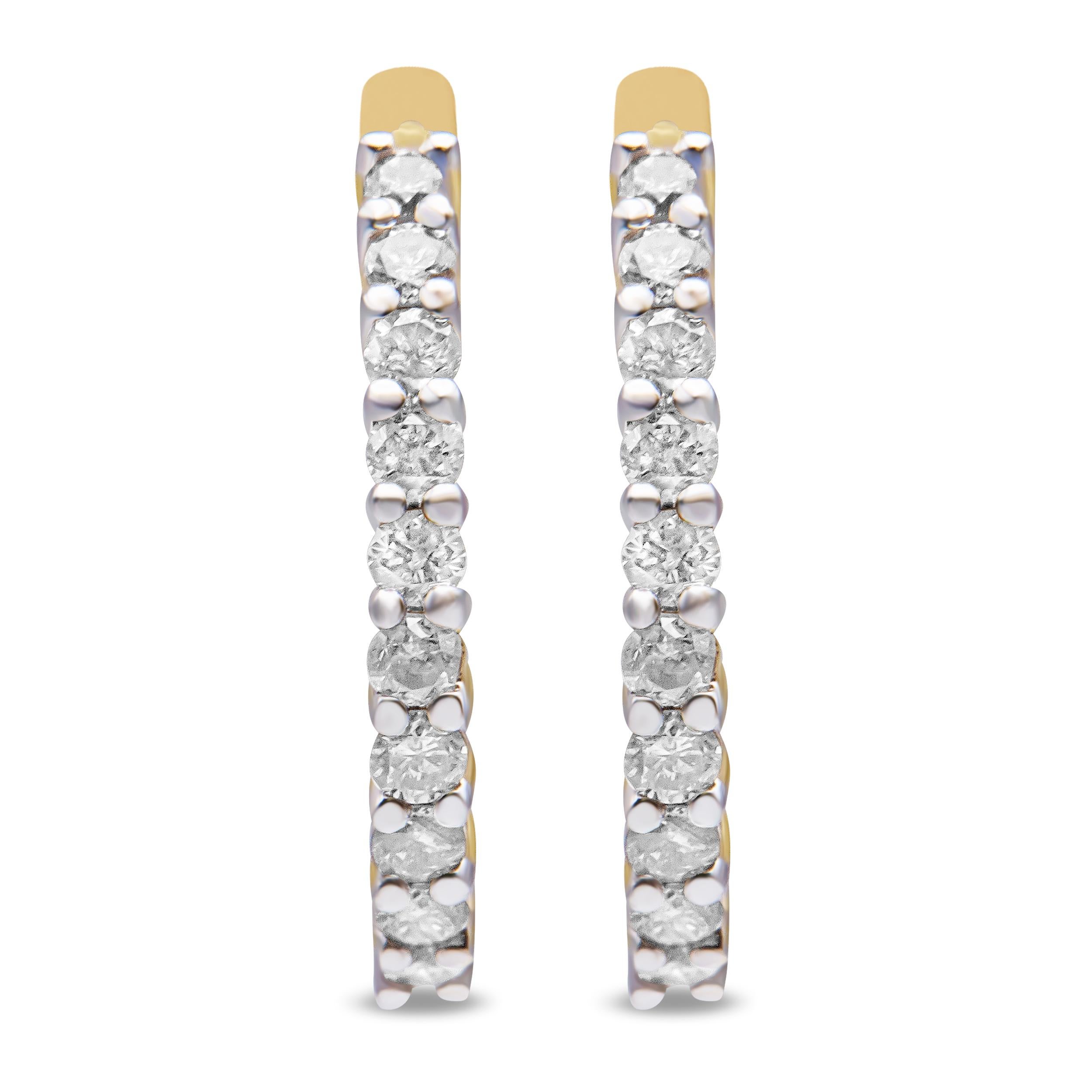 A modern take on a classic hoop design, these earrings sparkle with a total diamond weight of 1/2 c.t. This piece is crafted with beautiful 10k yellow gold, a metal that will stay tarnish free for years to come! The earrings are embellished with