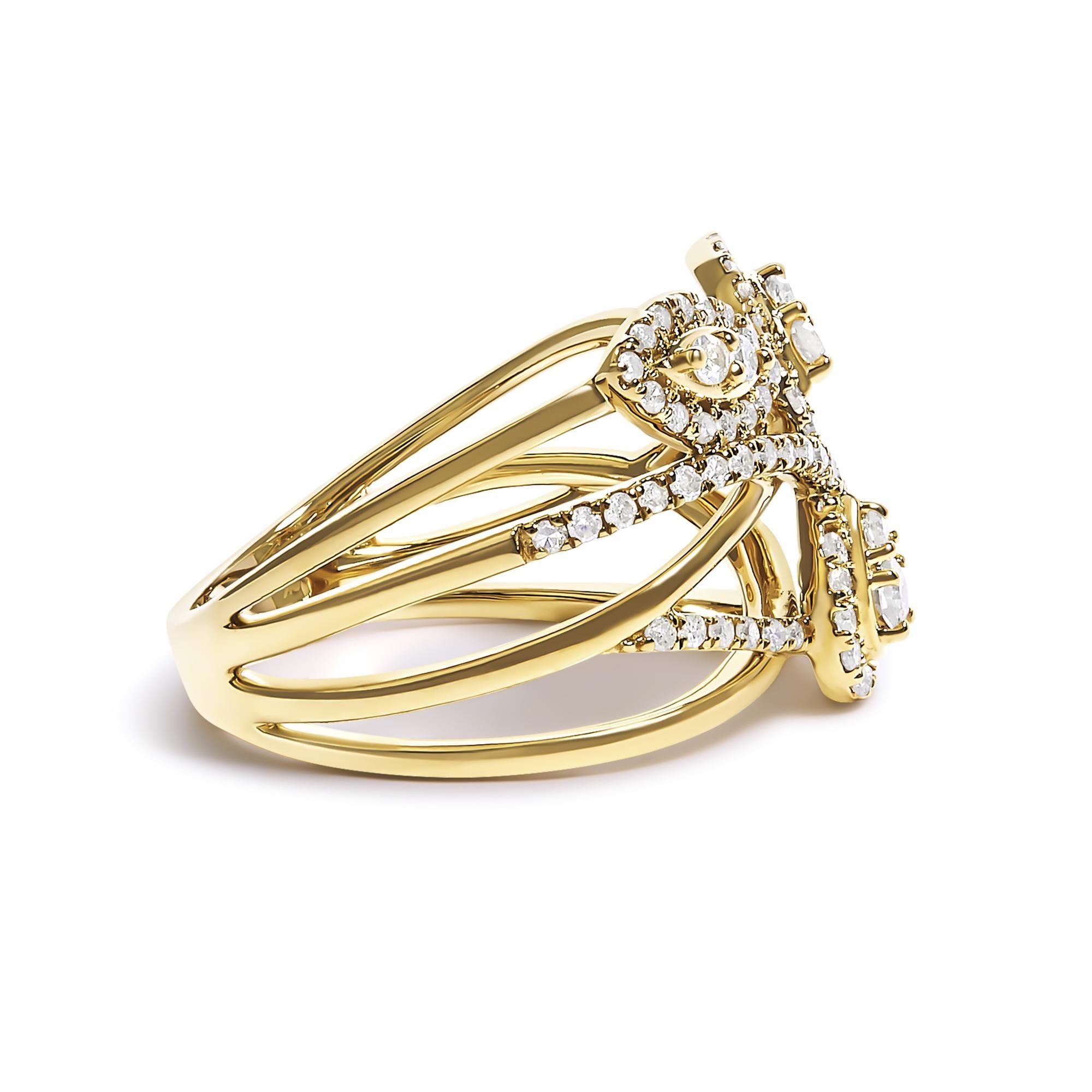 Entdecken Sie die Essenz von Eleganz und Handwerkskunst mit diesem exquisiten Cocktailring aus 10 Karat Gelbgold, in dem sich Luxus mit dem Charme der Natur verbindet. Das unverwechselbare Crossover-Design zeigt drei von Blättern inspirierte