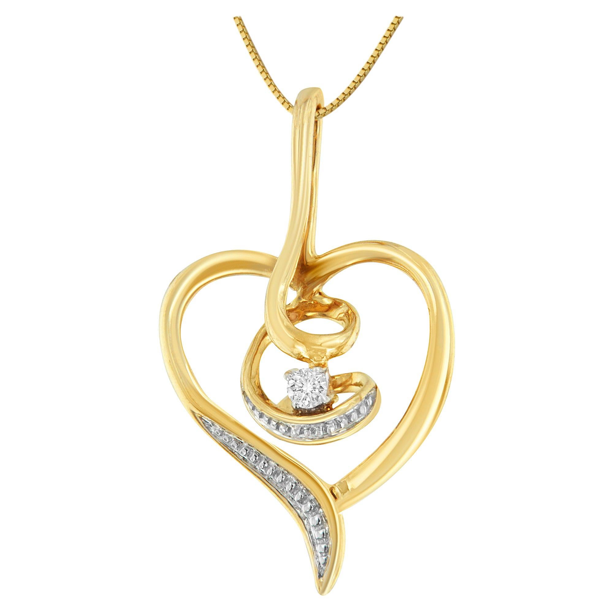 Collier pendentif cœur tourbillonnant en or jaune 10 carats avec diamants taille ronde de 1/25 carat