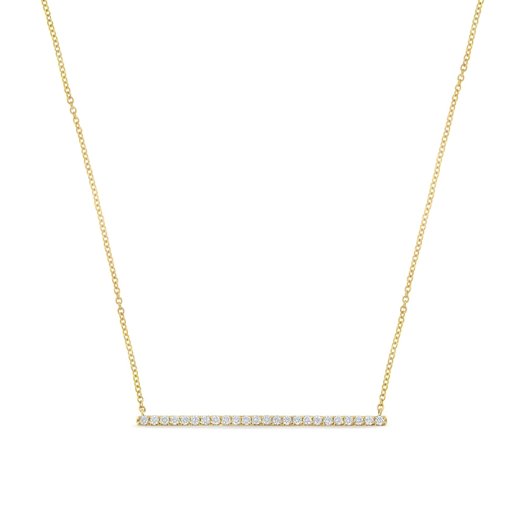Timeless and simple, this stunning 10 karats yellow gold neckpiece will add glittering modishness to your style. The rope chain features sparkling round brilliant cut diamond bar pendant. Further, it is highly polished with grace to enhance every