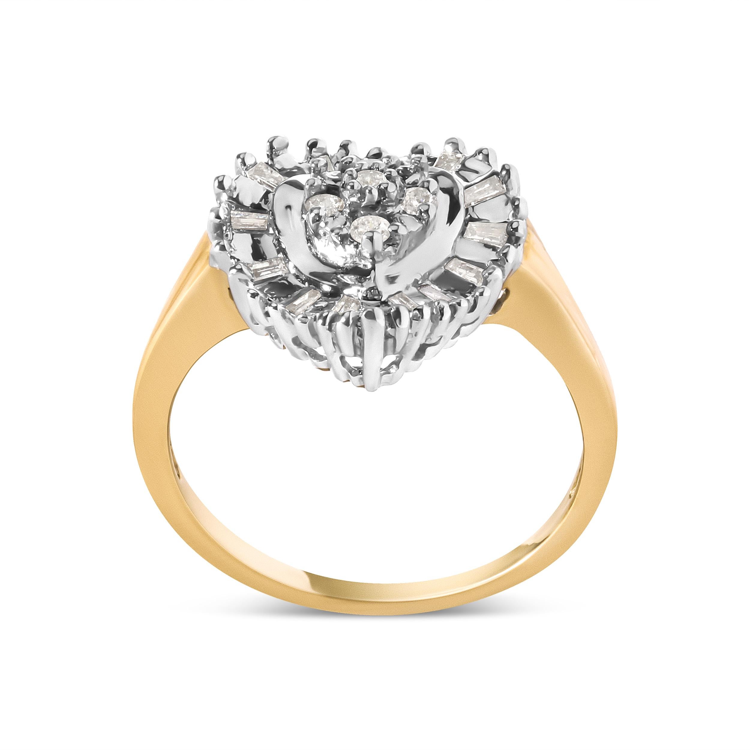 Cette magnifique bague de ballerine en or jaune 10K en forme de cœur est le moyen idéal de montrer votre amour et votre appréciation pour la personne qui vous est chère. La bague présente un éblouissant éventail de diamants ronds et baguettes dans