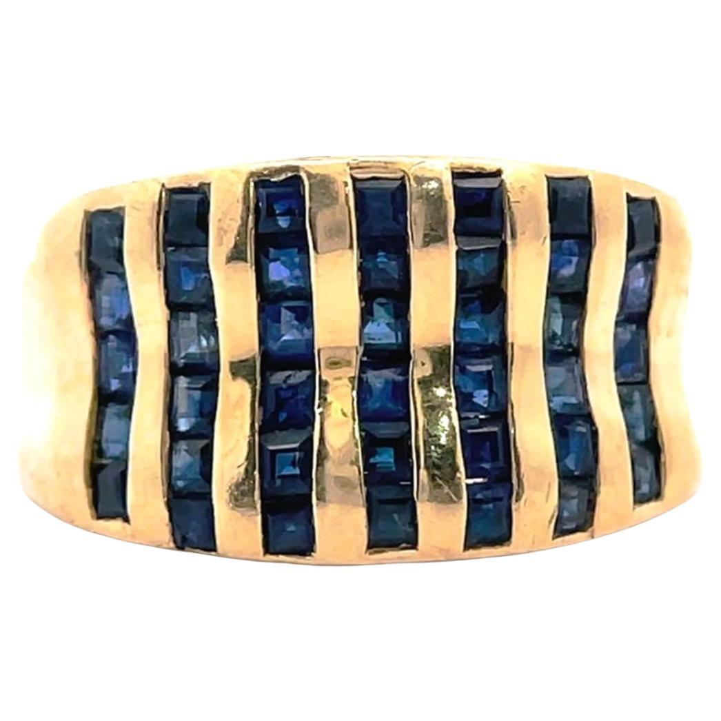 10k Yellow Gold 1 Carat Blue Sapphire Concave Chanel Ring Size 7 in vendita