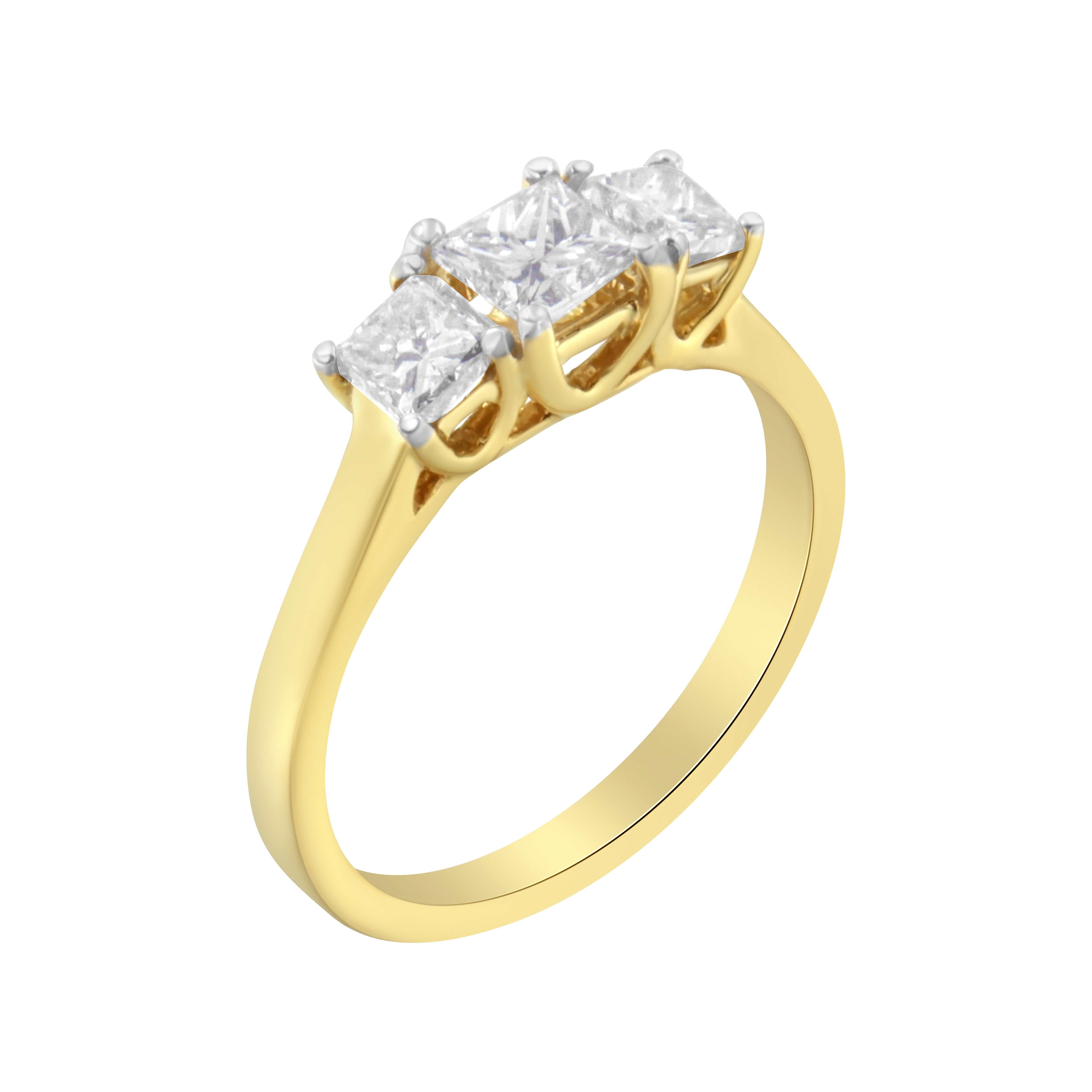 A three stone diamond ring that is delicately designed with three natural, sparkling princess-cut diamonds pring set in warm 10k Yellow Gold. The 3 princess cut diamonds add up to a stunning 1 carat diamond total weight. This ring is the perfect way