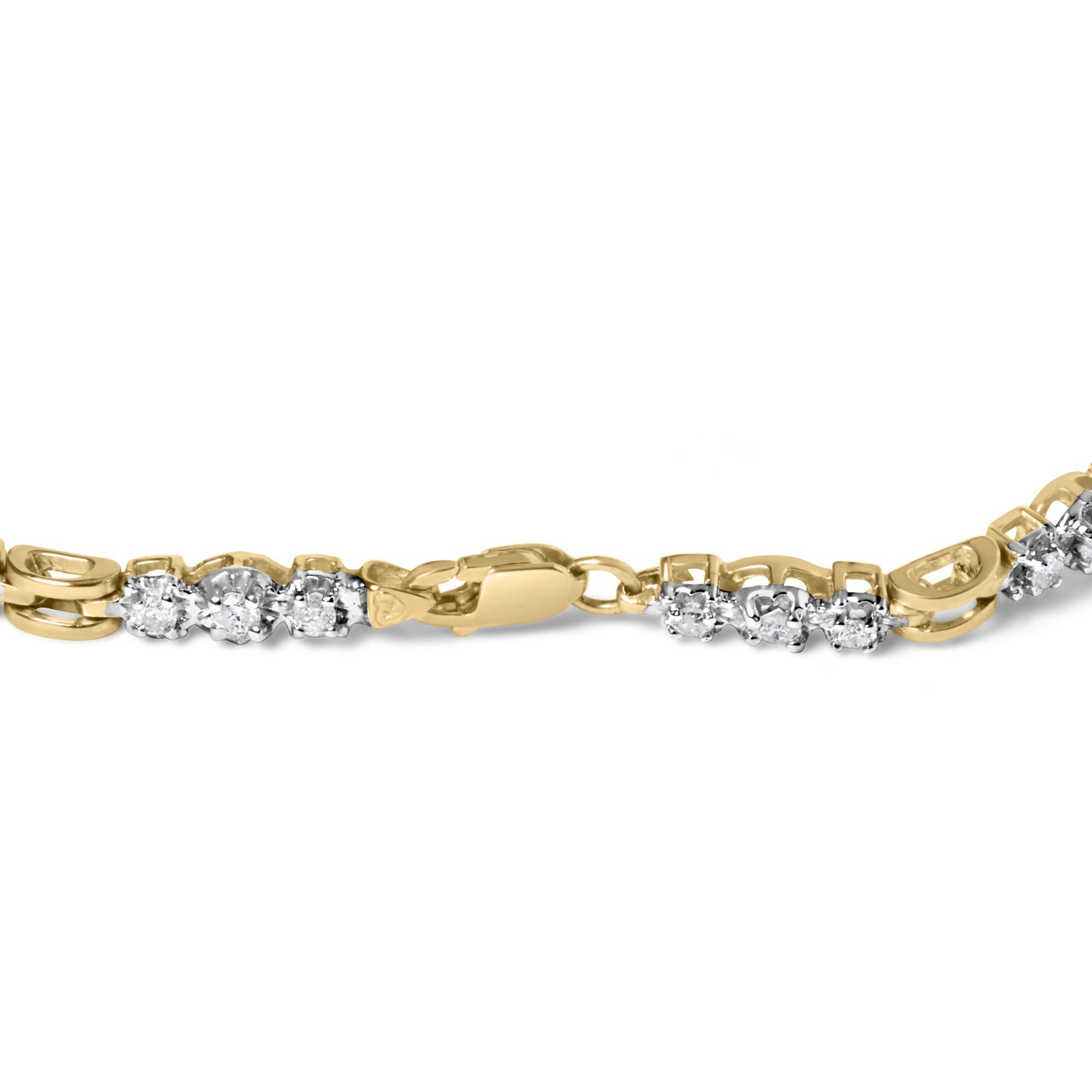 Riscopri l'eleganza con questo incantevole braccialetto, meticolosamente realizzato in radioso oro giallo 10k, perfetto per polsi fino a 7,25 pollici. La chiusura a moschettone promette un abbraccio sicuro, assicurando che questo pezzo squisito