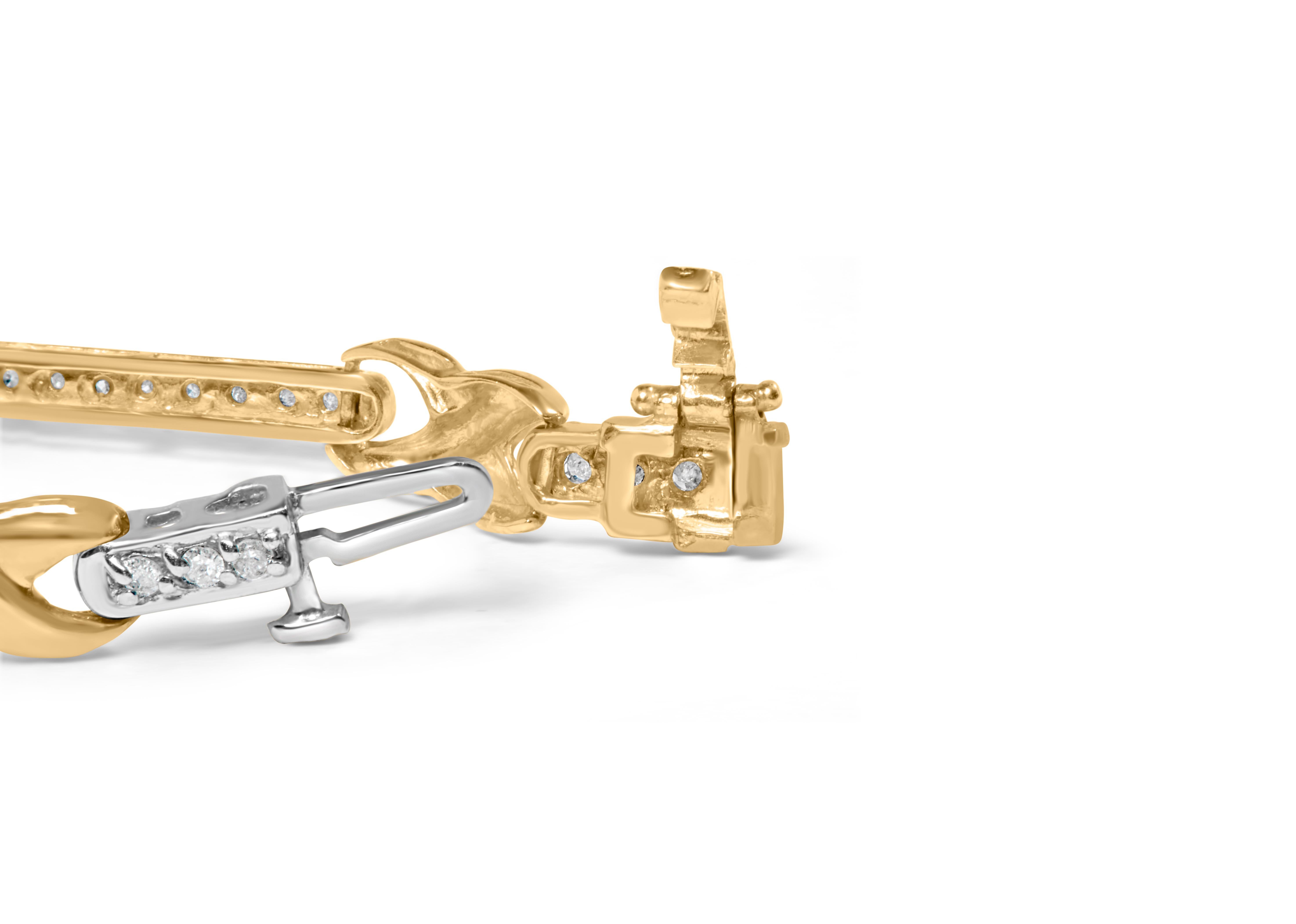 Ce superbe bracelet en or jaune 10 carats est un must pour toute femme à la mode. Avec un poids total de 1,00 cttw et 61 diamants ronds naturels, ce bracelet à maillons en X serti de pavés ne manquera pas d'attirer l'attention. Les diamants de