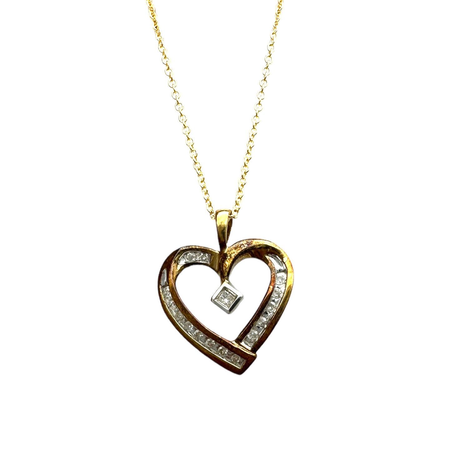 The 10-karat Yellow Diamond Heart and Chain is a stunning accessory for any occasion. It features a beautiful diamond heart pendant crafted from sterling silver and complemented by a shimmering 14K gold-plated chain. This elegant necklace is the