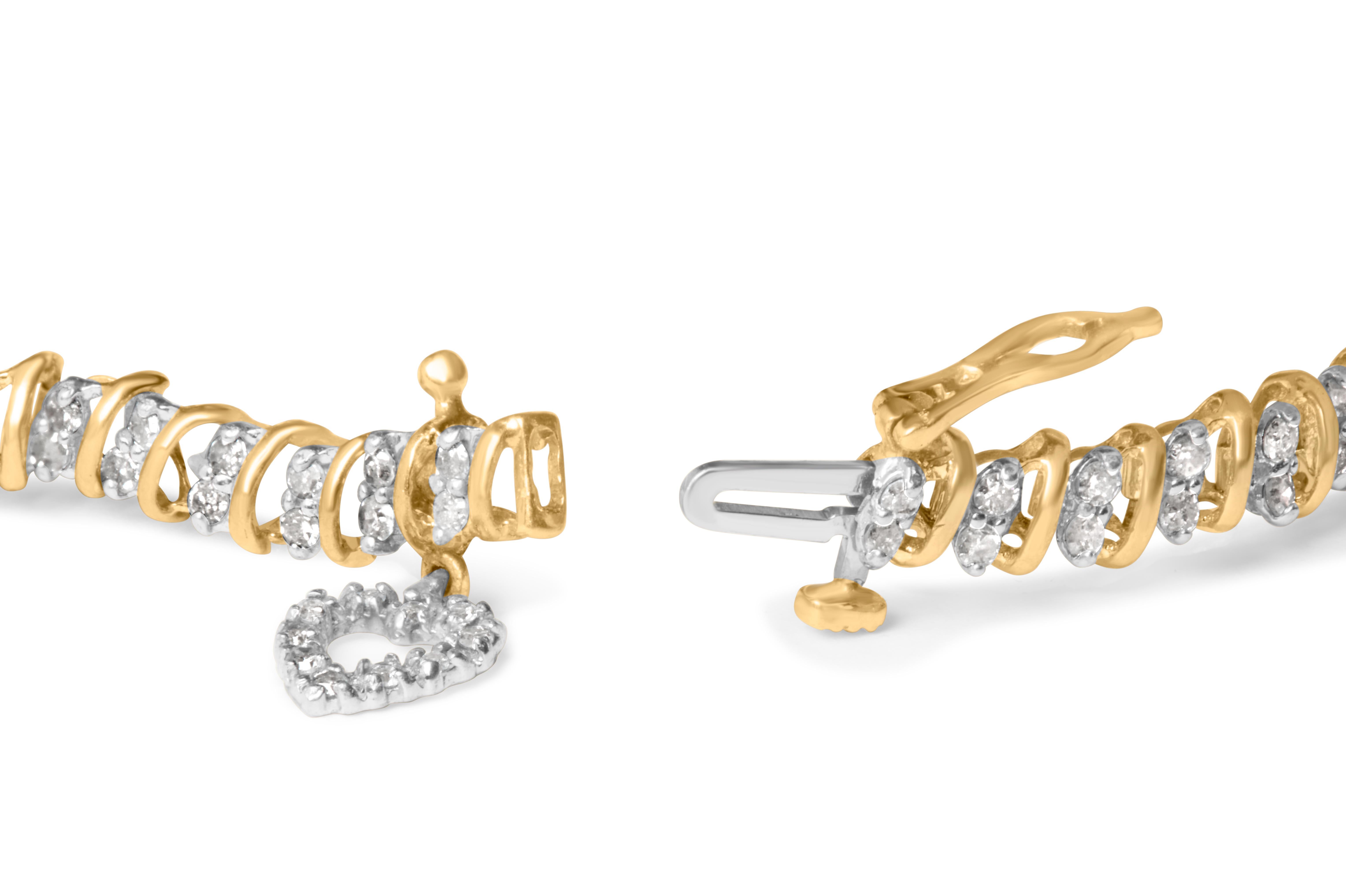 Ce superbe bracelet à maillons en or jaune 10K est un must pour toute femme à la pointe de la mode. Avec 104 diamants ronds naturels d'une valeur totale de 2,0 cttw, ce bracelet est un véritable coup de cœur. Les diamants sont sertis en deux