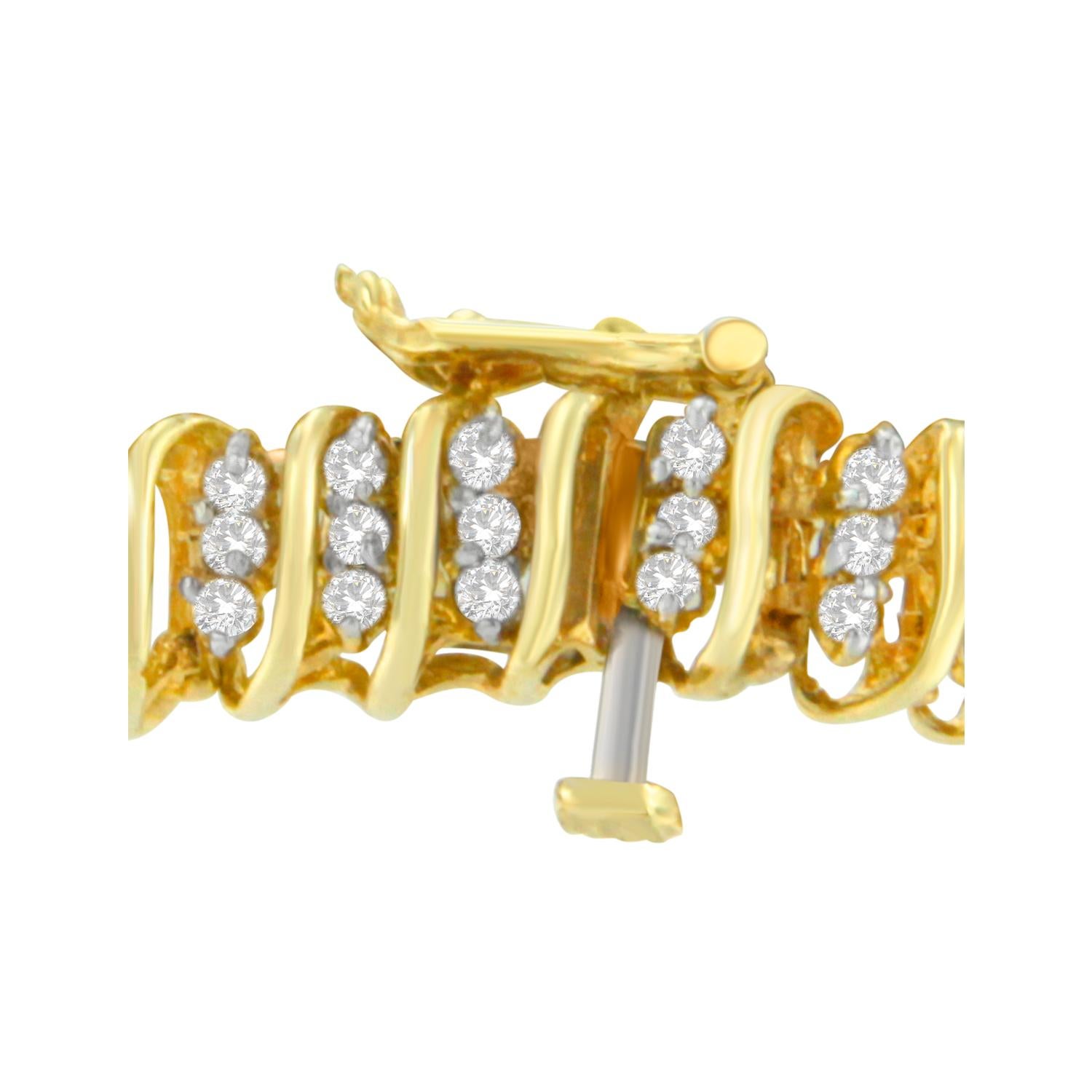 Each trio of round diamonds on this elegant bracelet is connected by a loop of shimmering yellow gold, which wraps around for an eye-catching presentation. Two carats in total make this one style that's sure to make her stand out. This diamond is