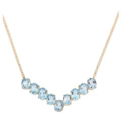 Collier en or jaune 10 carats avec topaze bleue 21,42 TCW
