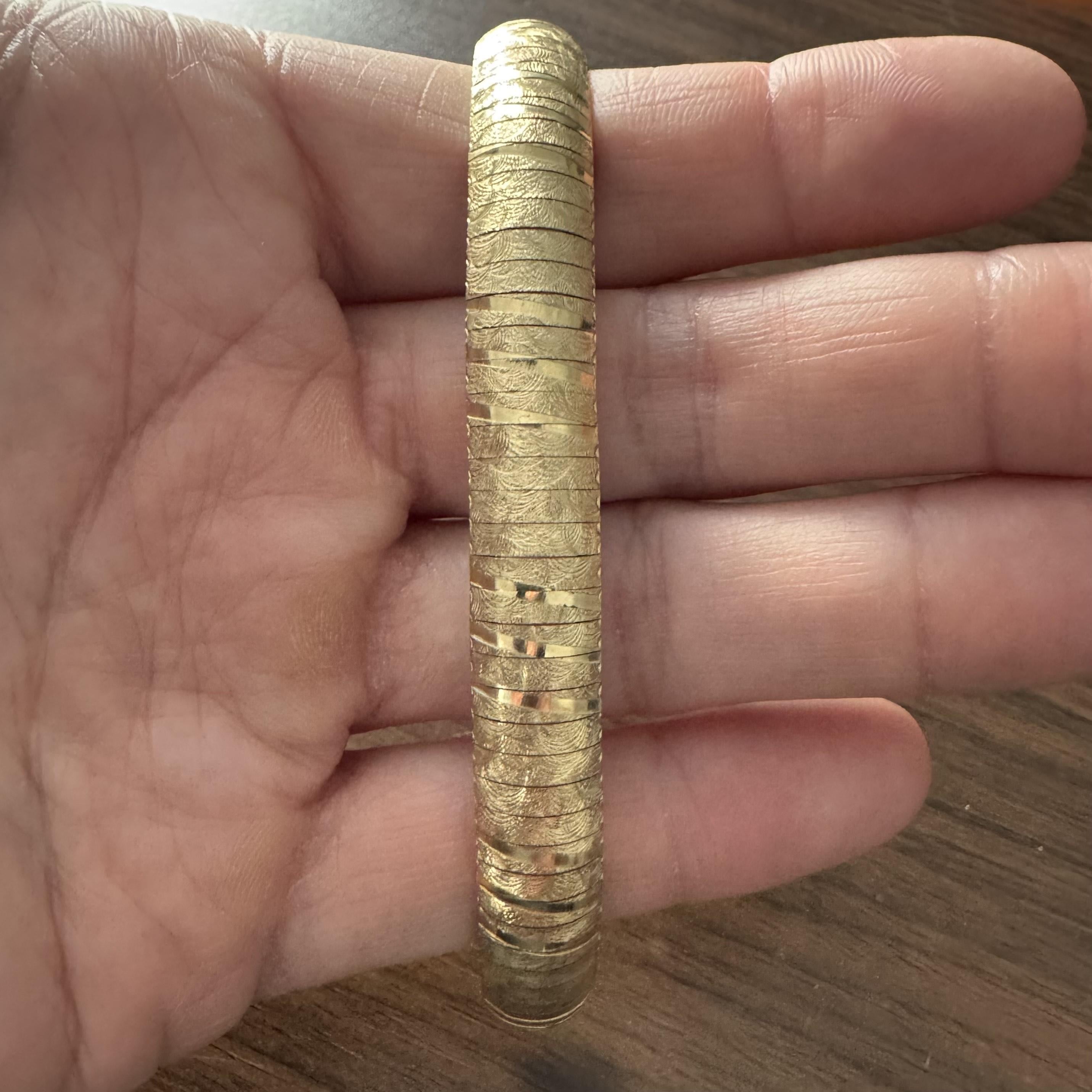 Condition:  Excellent Condition, Professionally Cleaned and Polished
Metal:  10k Gold (Marked, and Professionally Tested)
Weight:  21.5g
Length:  7.25 Inches
Width:  11mm
Closure:  Box Tab Insert with Safety Latch
Markings:  